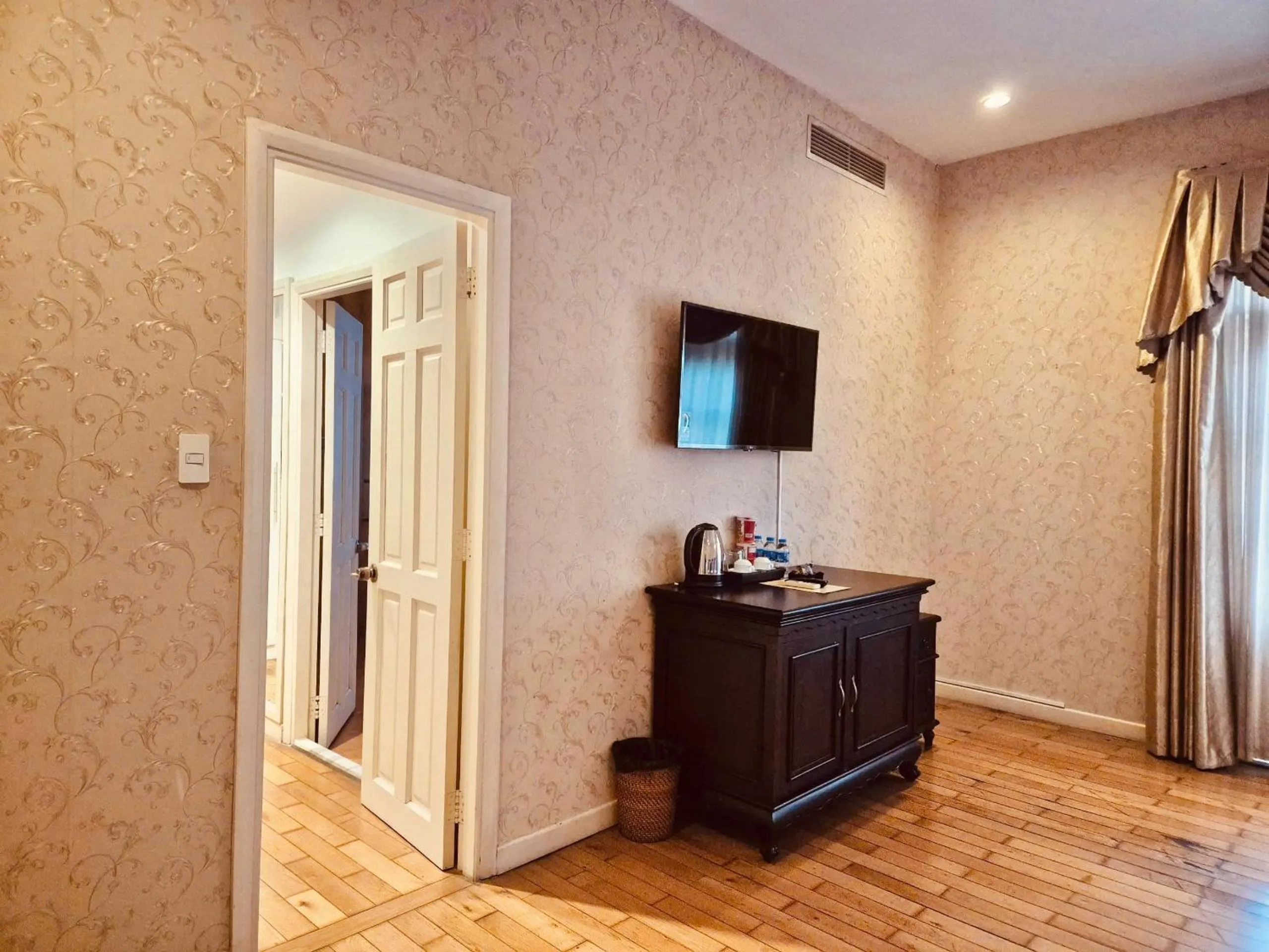 wardrobe in Hidden Mansions Saigon Resort