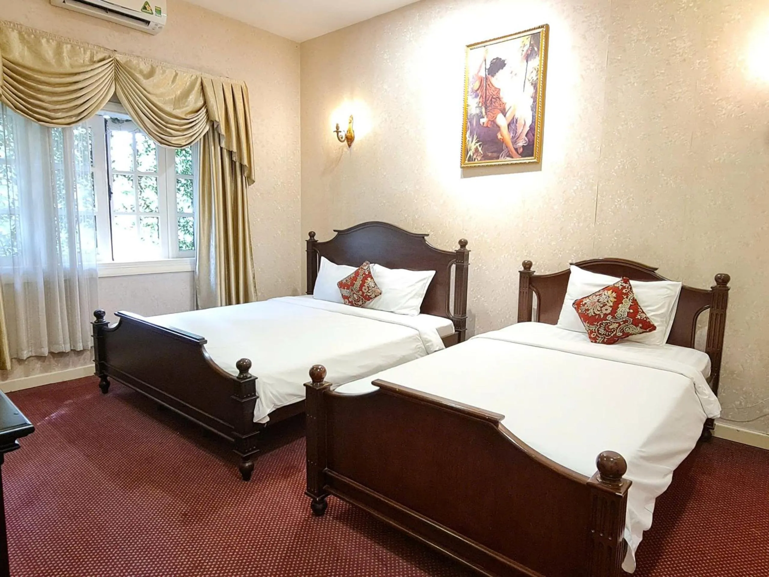 Living room, Bed in Hidden Mansions Saigon Resort