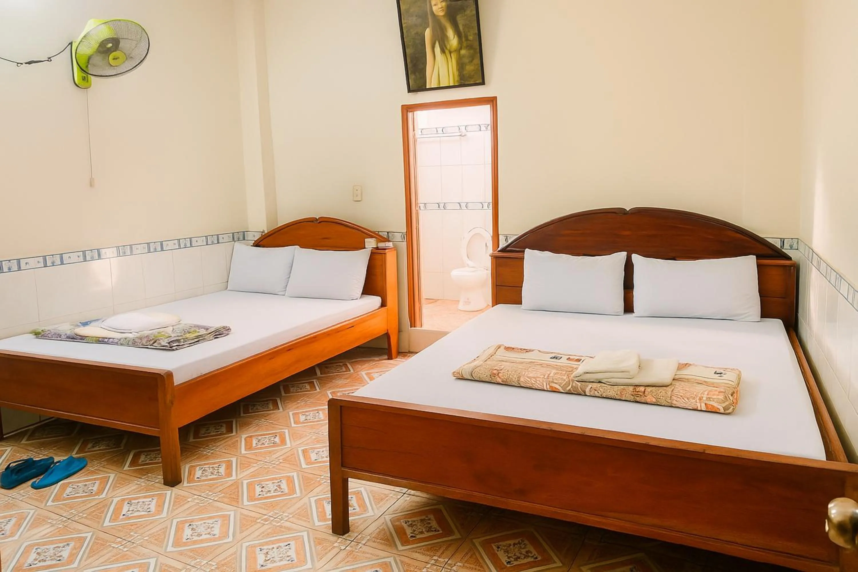 Photo of the whole room, Bed in QUỲNH HOA HOTEL