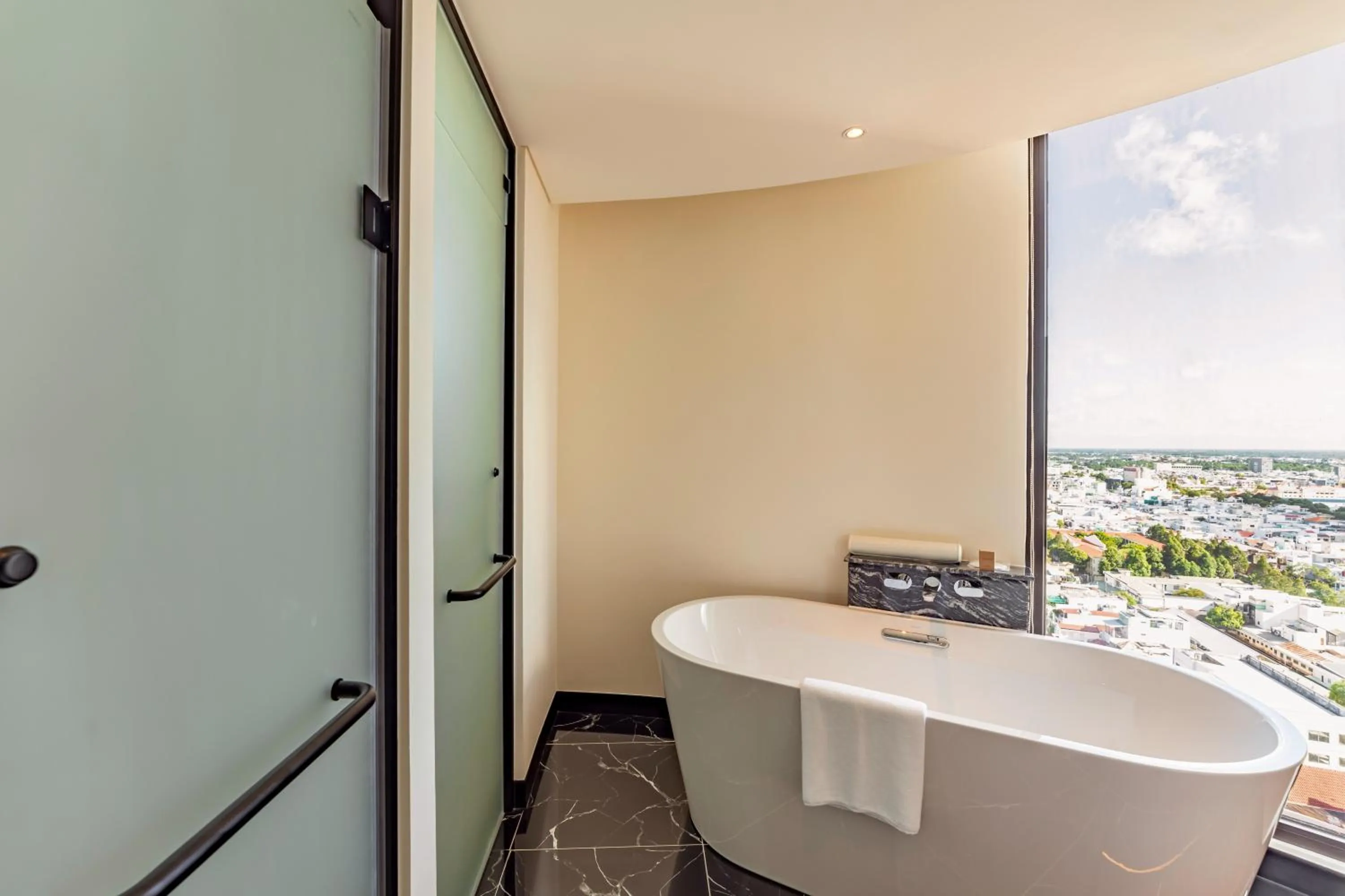 Bathroom in Charmant Suites a Boutique Hotel Can Tho