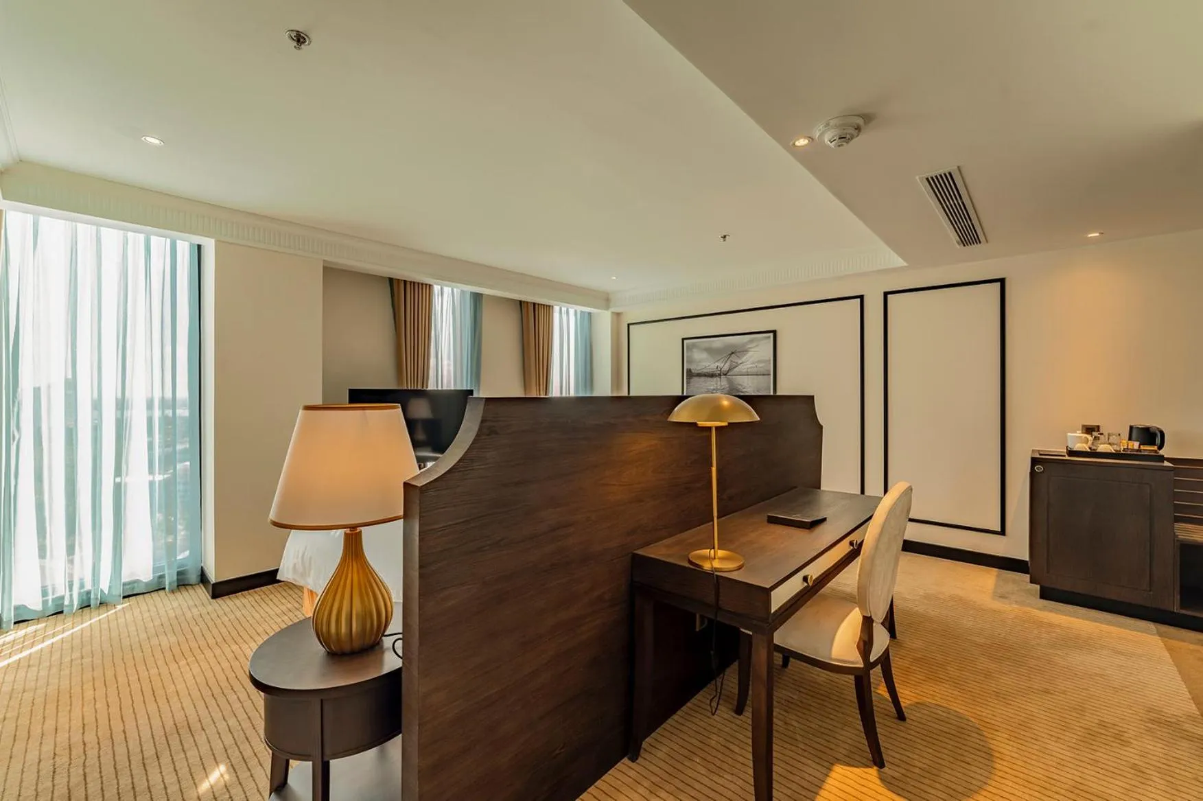 Bed in Charmant Suites a Boutique Hotel Can Tho