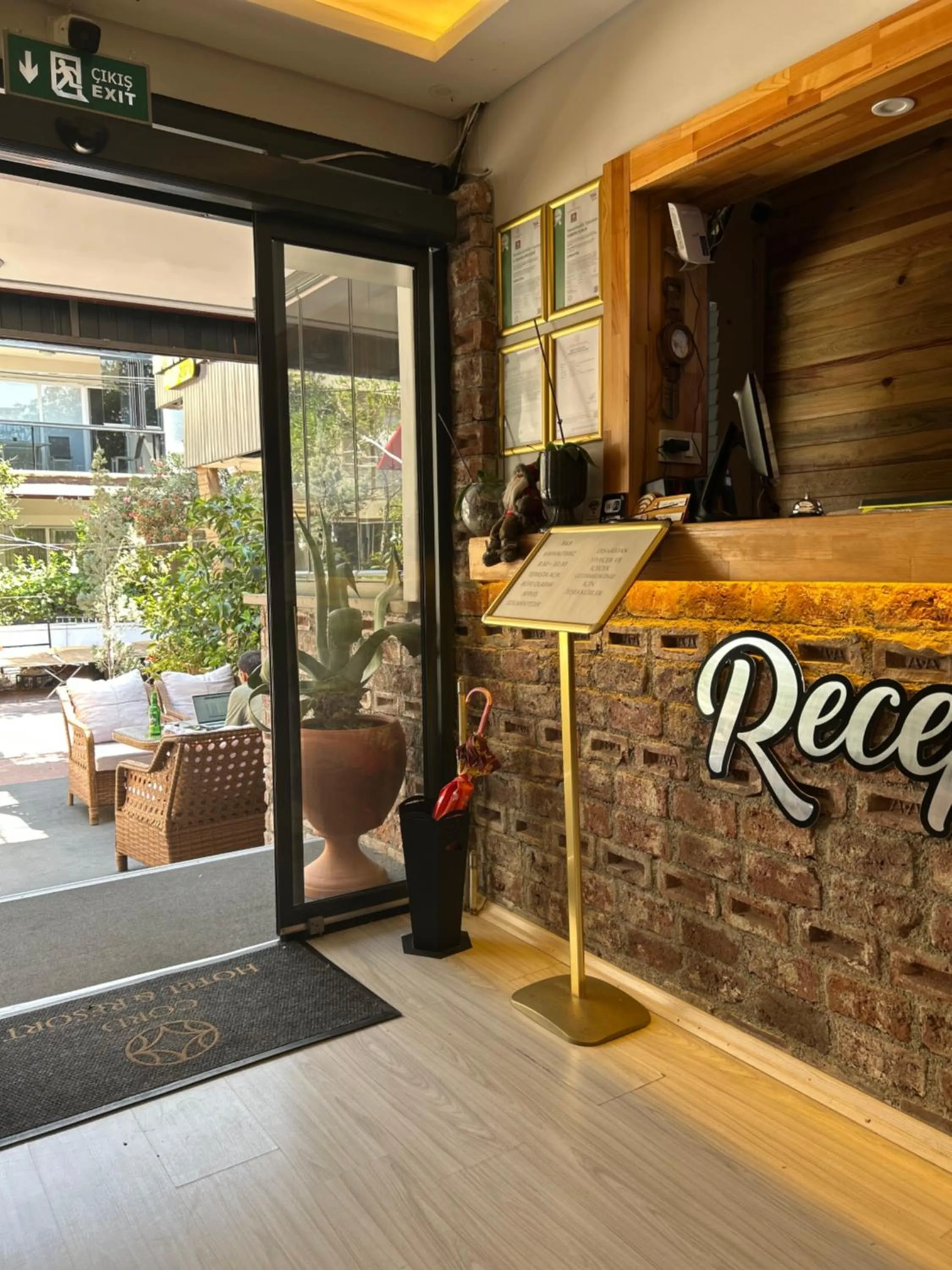 Property logo or sign in Cord Hotel & Resort