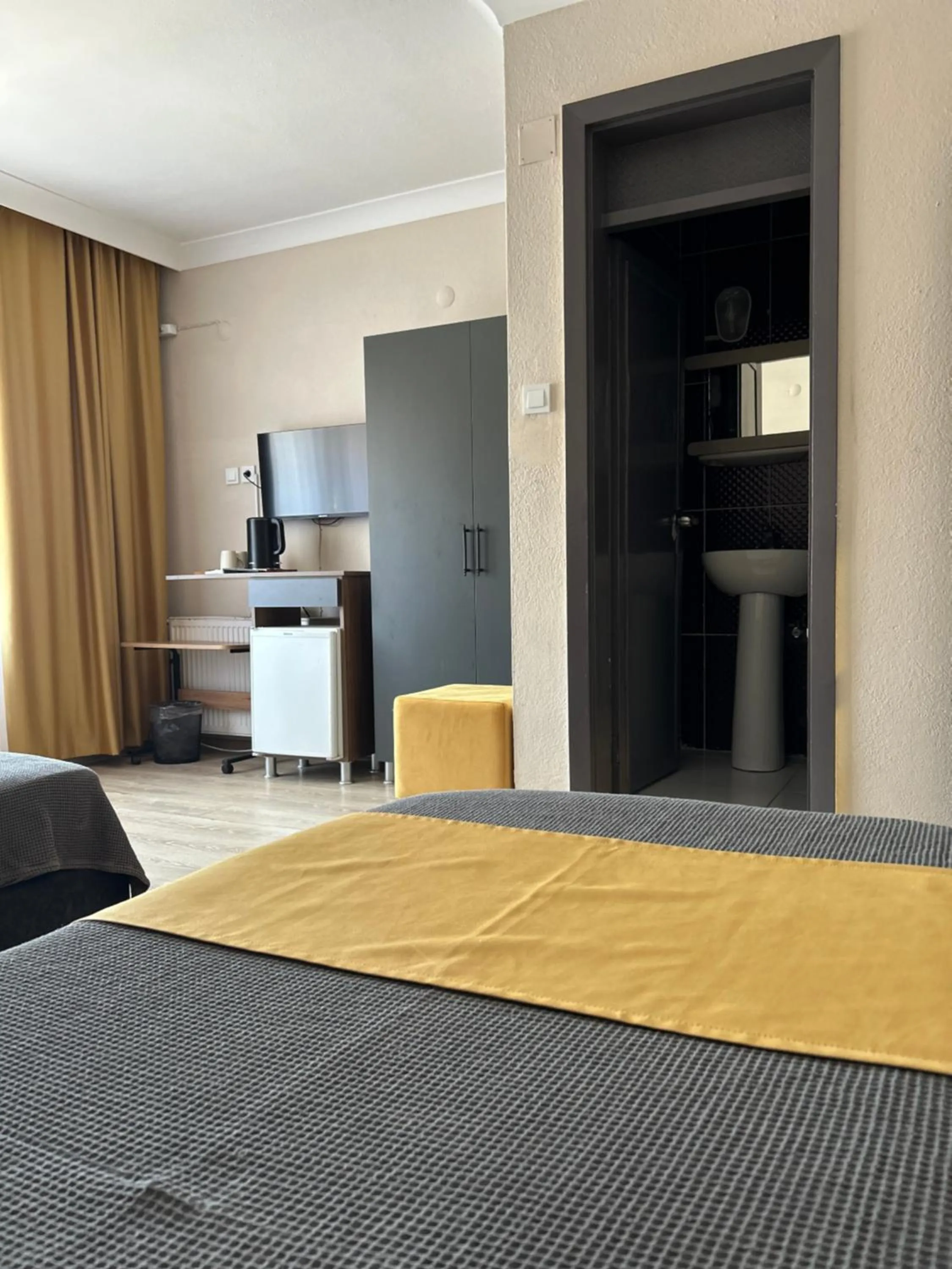 Bed in Cord Hotel & Resort