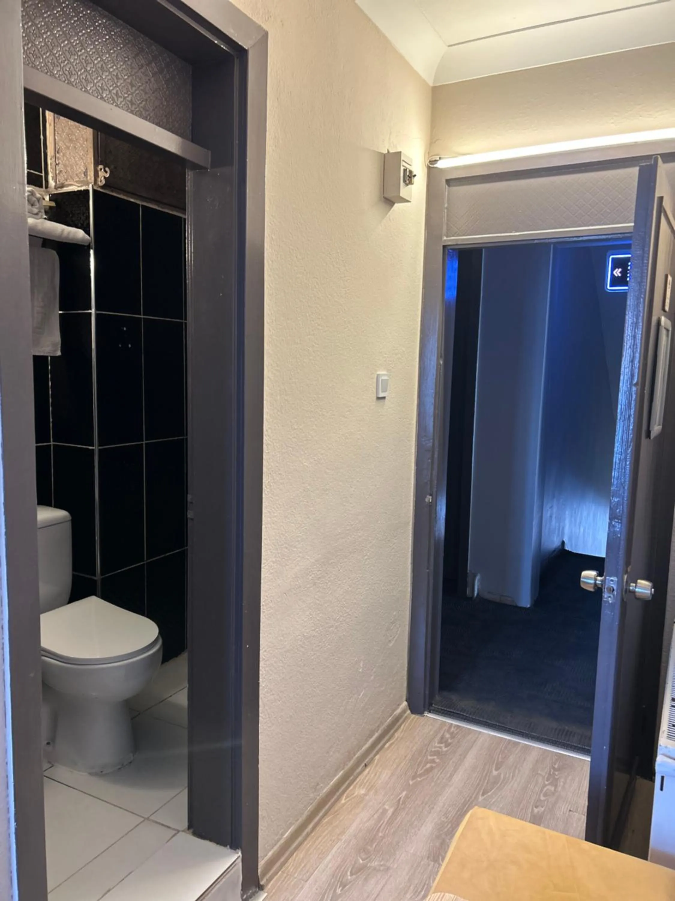 Toilet in Cord Hotel & Resort