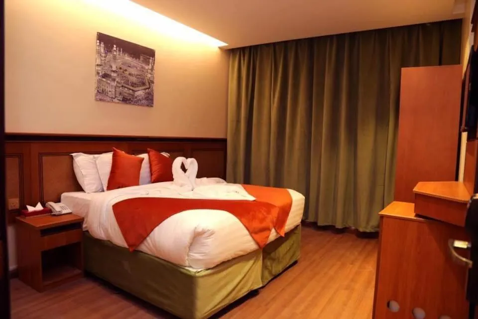 Bed in Al Bostan Al Masi Hotel