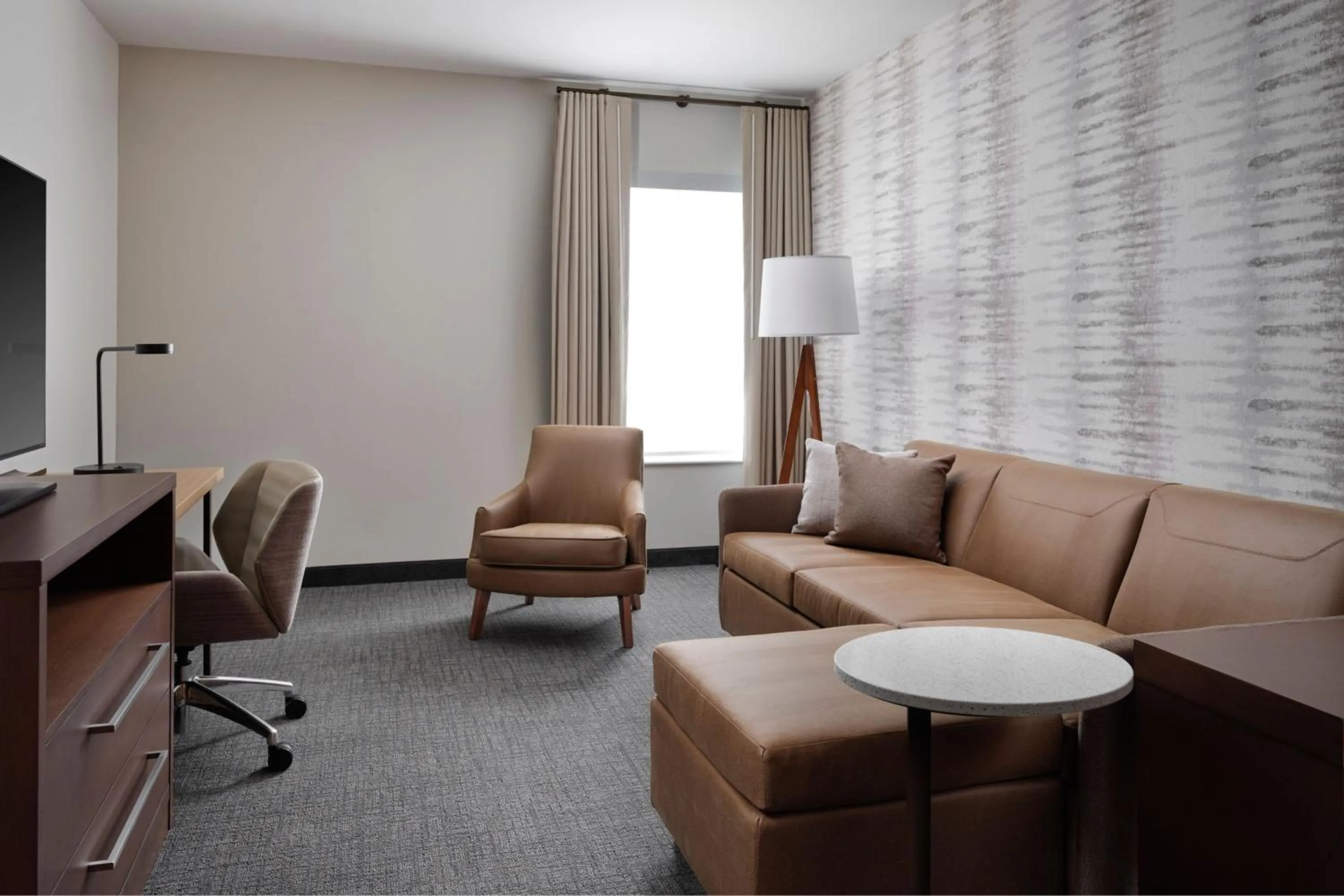 Living room in Inn at Bellefield Residence Inn by Marriott