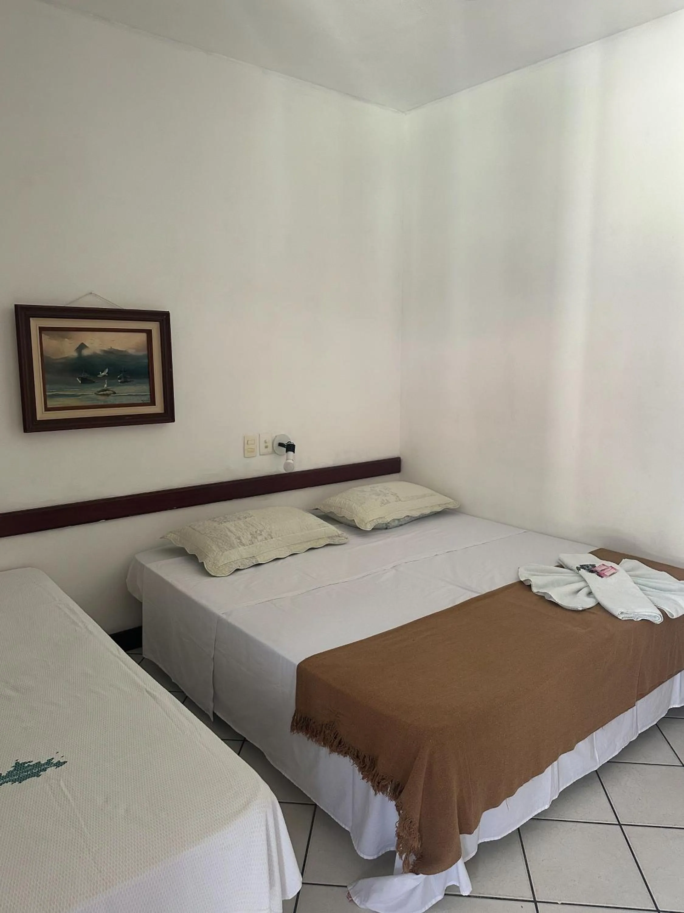 Bed in Pousada Paraíso Ilha Grande