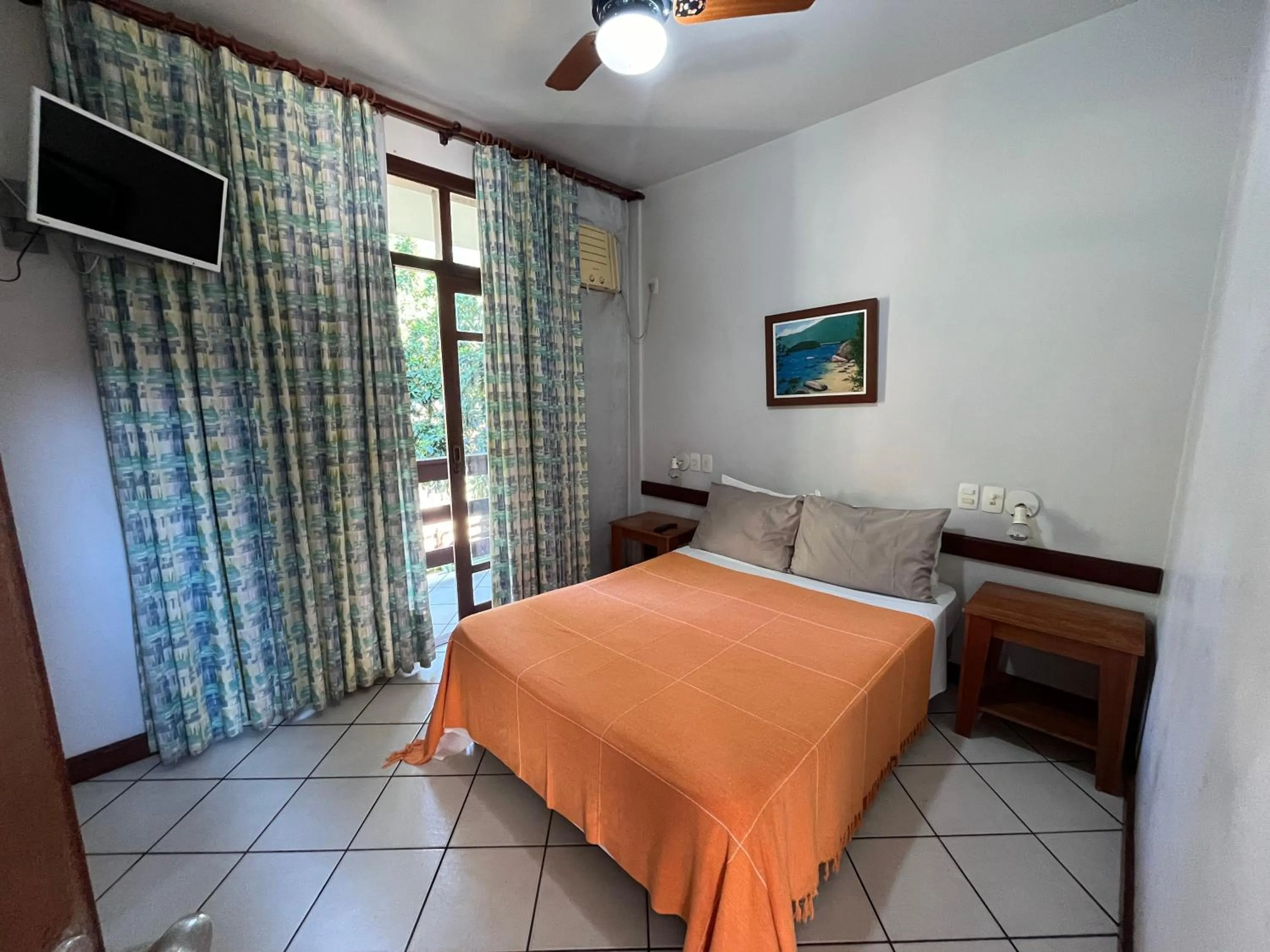 Bed in Pousada Paraíso Ilha Grande