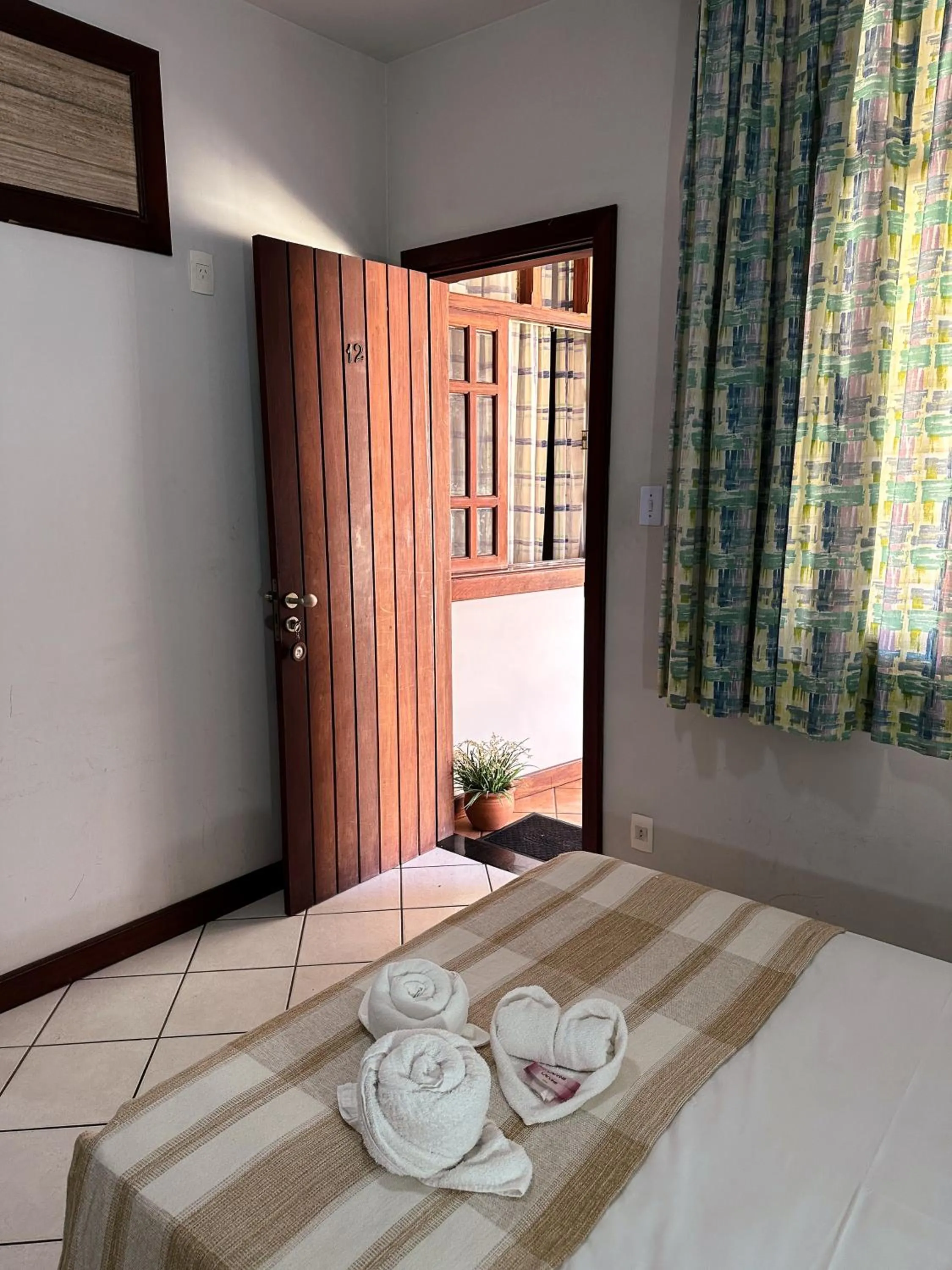 Bed in Pousada Paraíso Ilha Grande