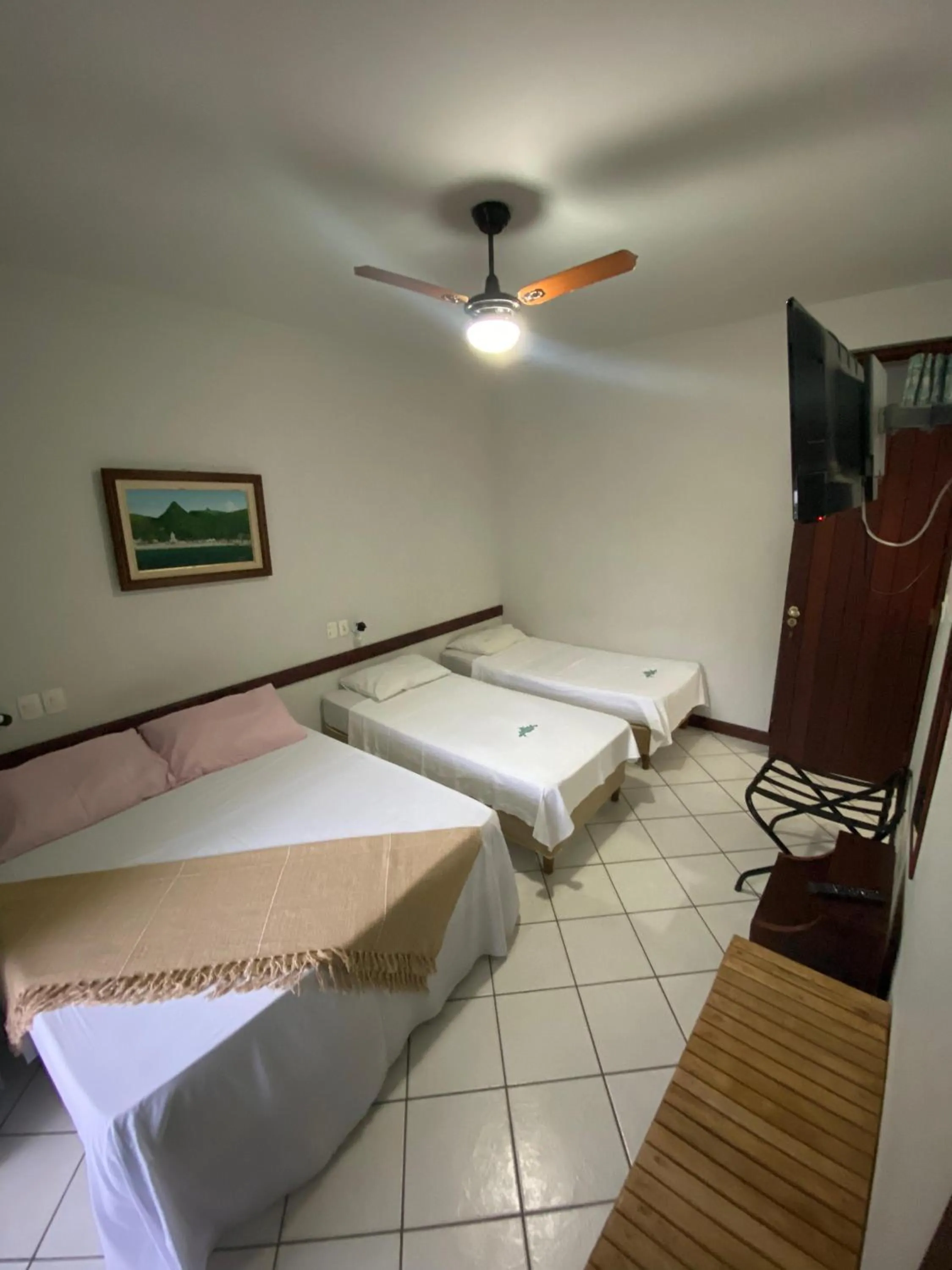 Bed in Pousada Paraíso Ilha Grande