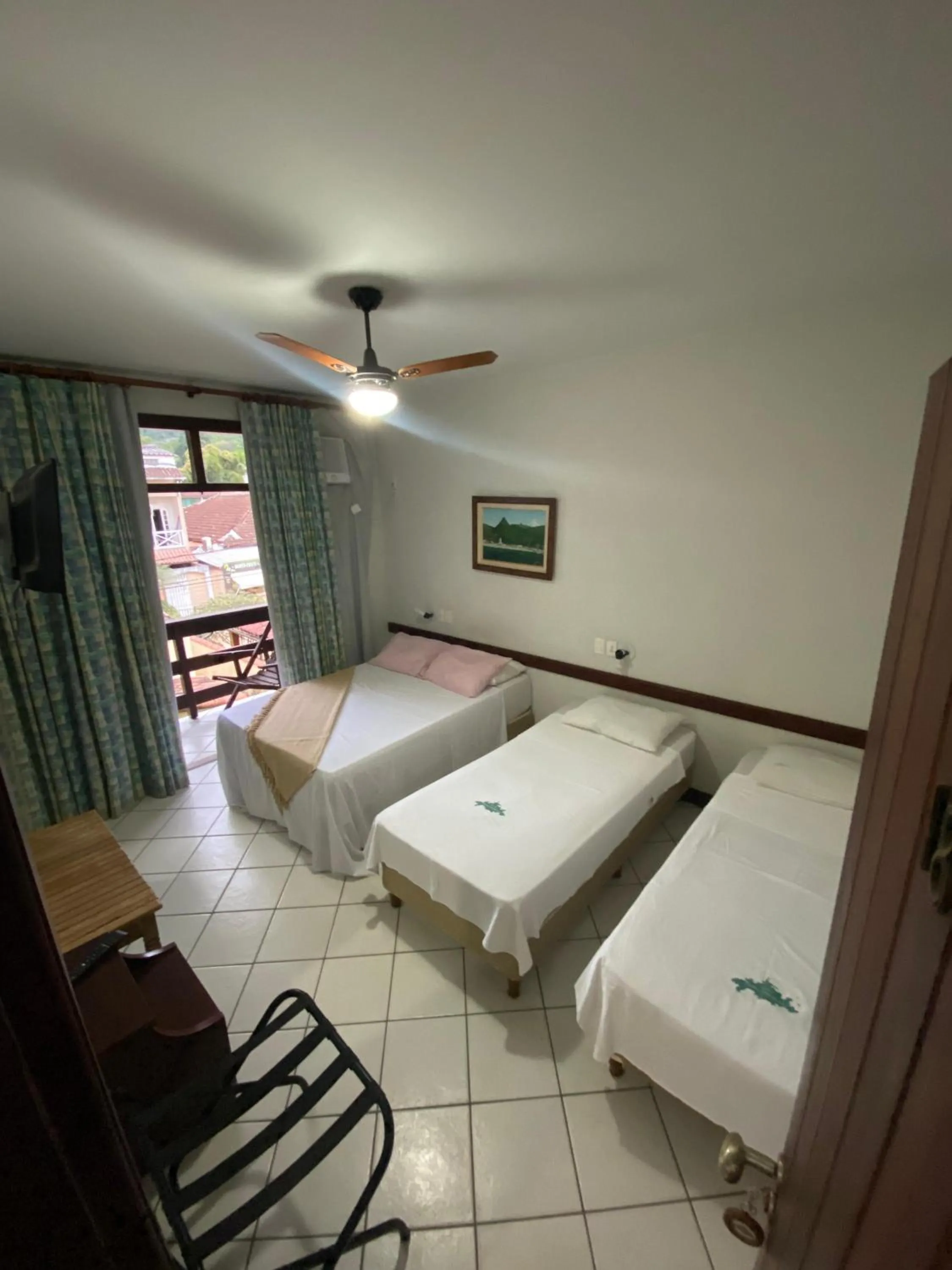 Bed in Pousada Paraíso Ilha Grande