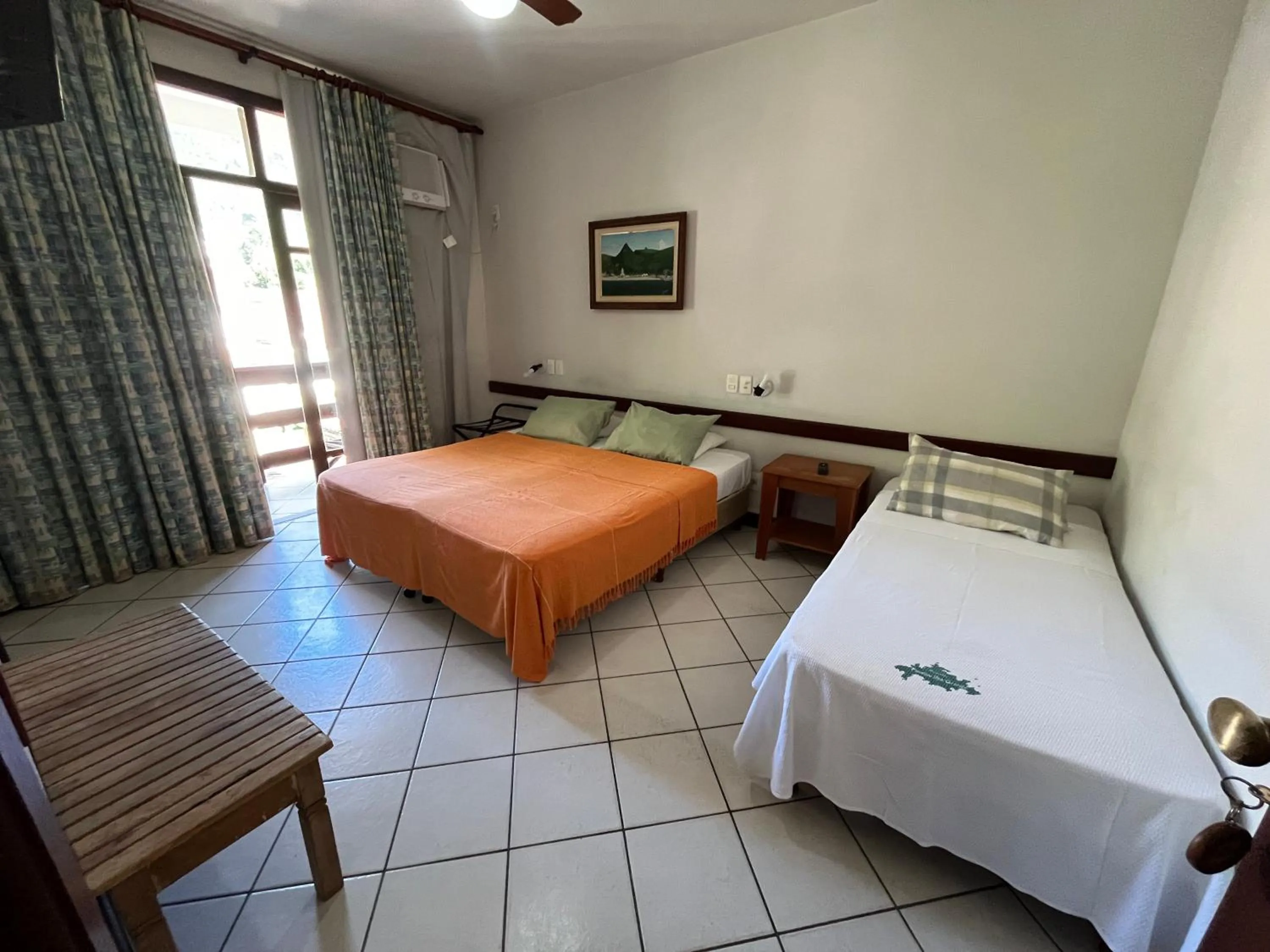 Bed in Pousada Paraíso Ilha Grande