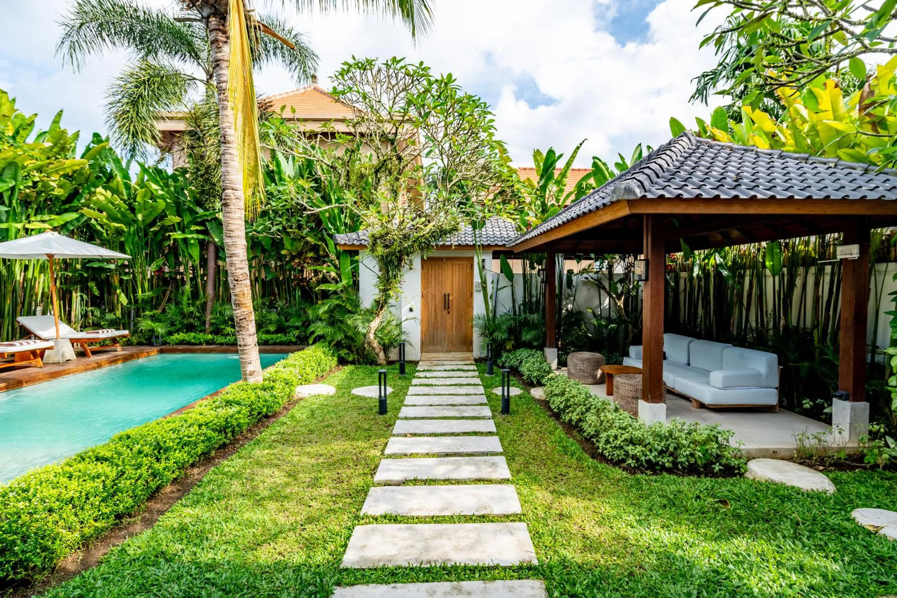 Garden in Hijau Villa by EVDEkimi - Charming 2BR escape with Pool, Outdoor Lounge, Lush Garden