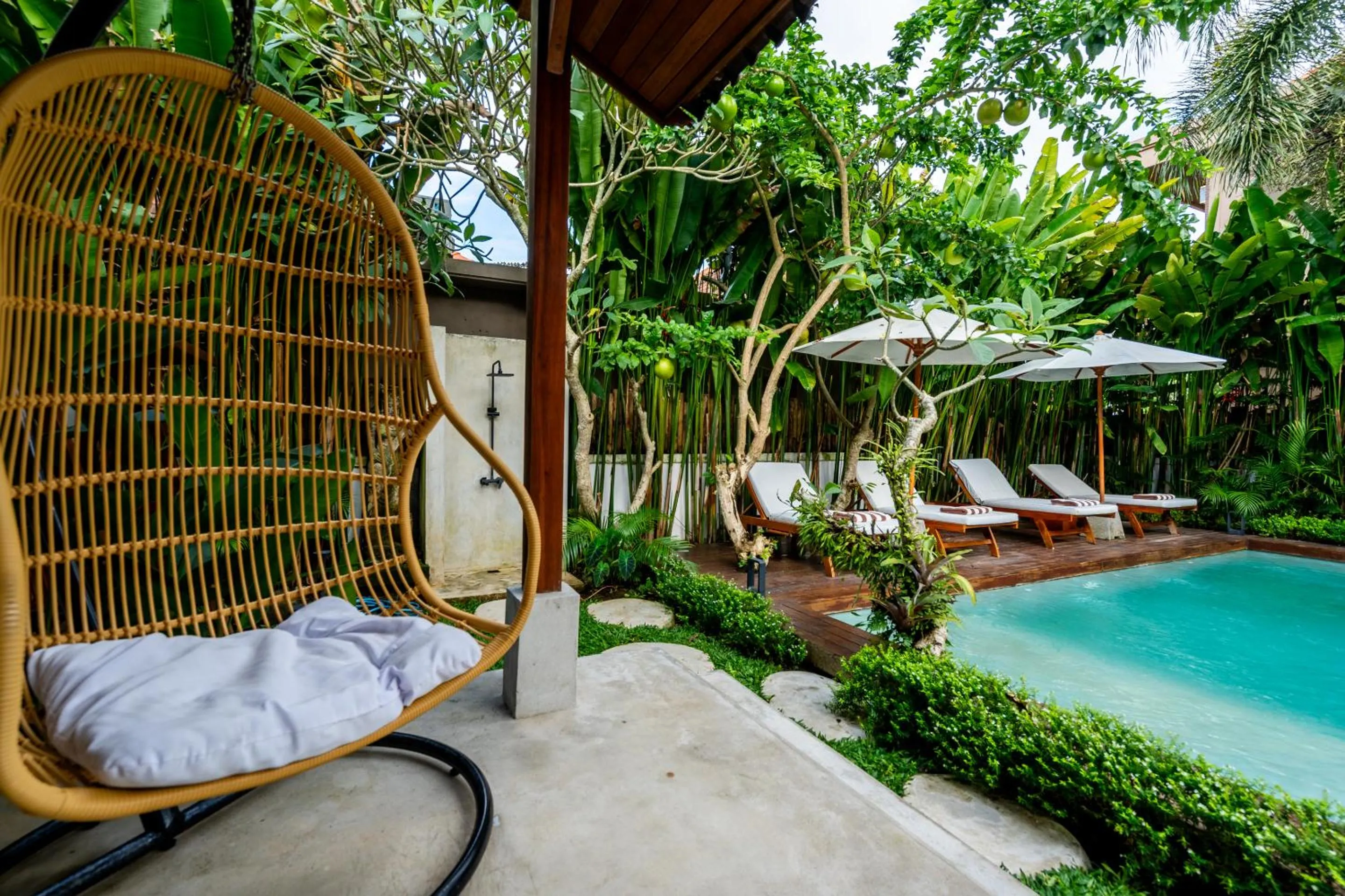 Garden in Hijau Villa by EVDEkimi - Charming 2BR escape with Pool, Outdoor Lounge, Lush Garden