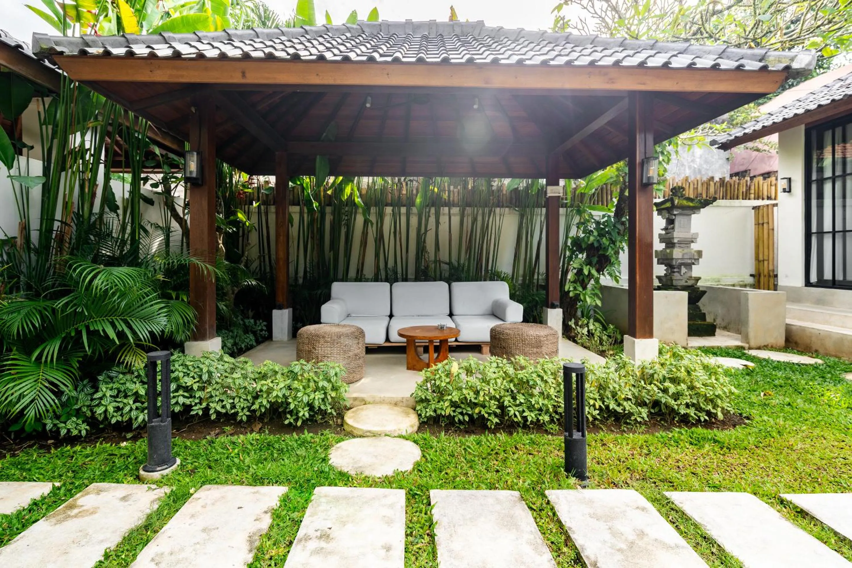 Garden in Hijau Villa by EVDEkimi - Charming 2BR escape with Pool, Outdoor Lounge, Lush Garden