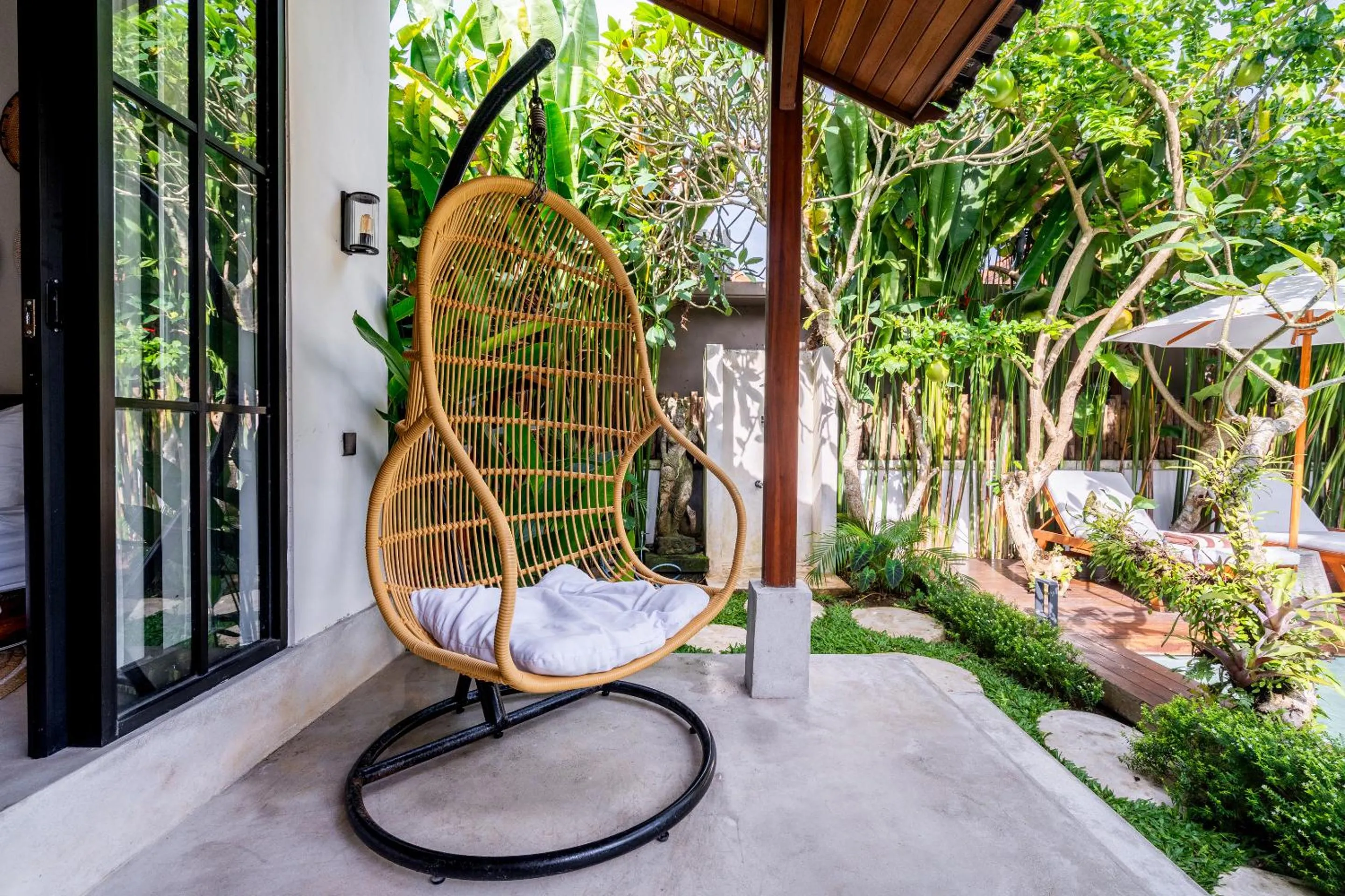 Garden in Hijau Villa by EVDEkimi - Charming 2BR escape with Pool, Outdoor Lounge, Lush Garden