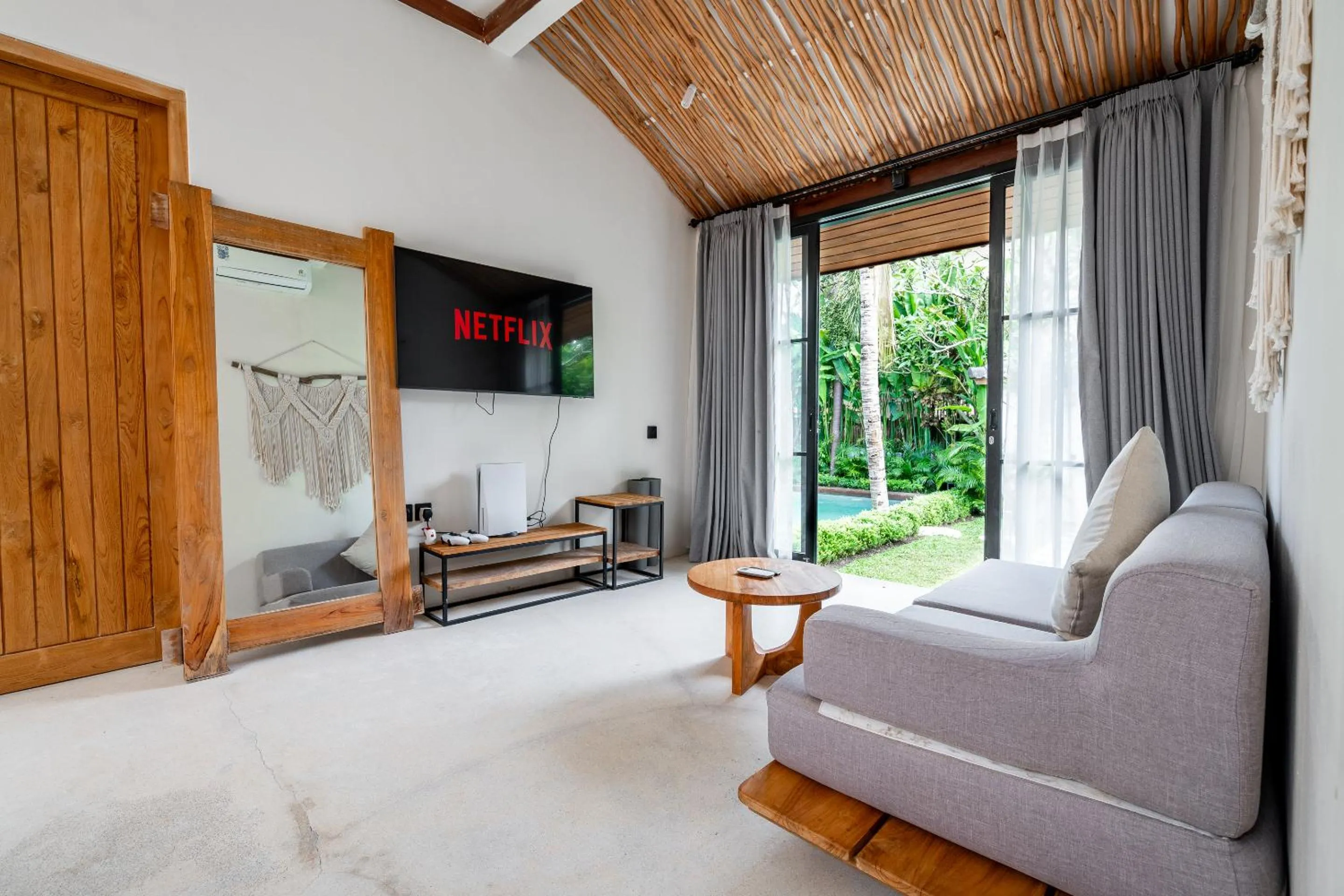 TV and multimedia in Hijau Villa by EVDEkimi - Charming 2BR escape with Pool, Outdoor Lounge, Lush Garden