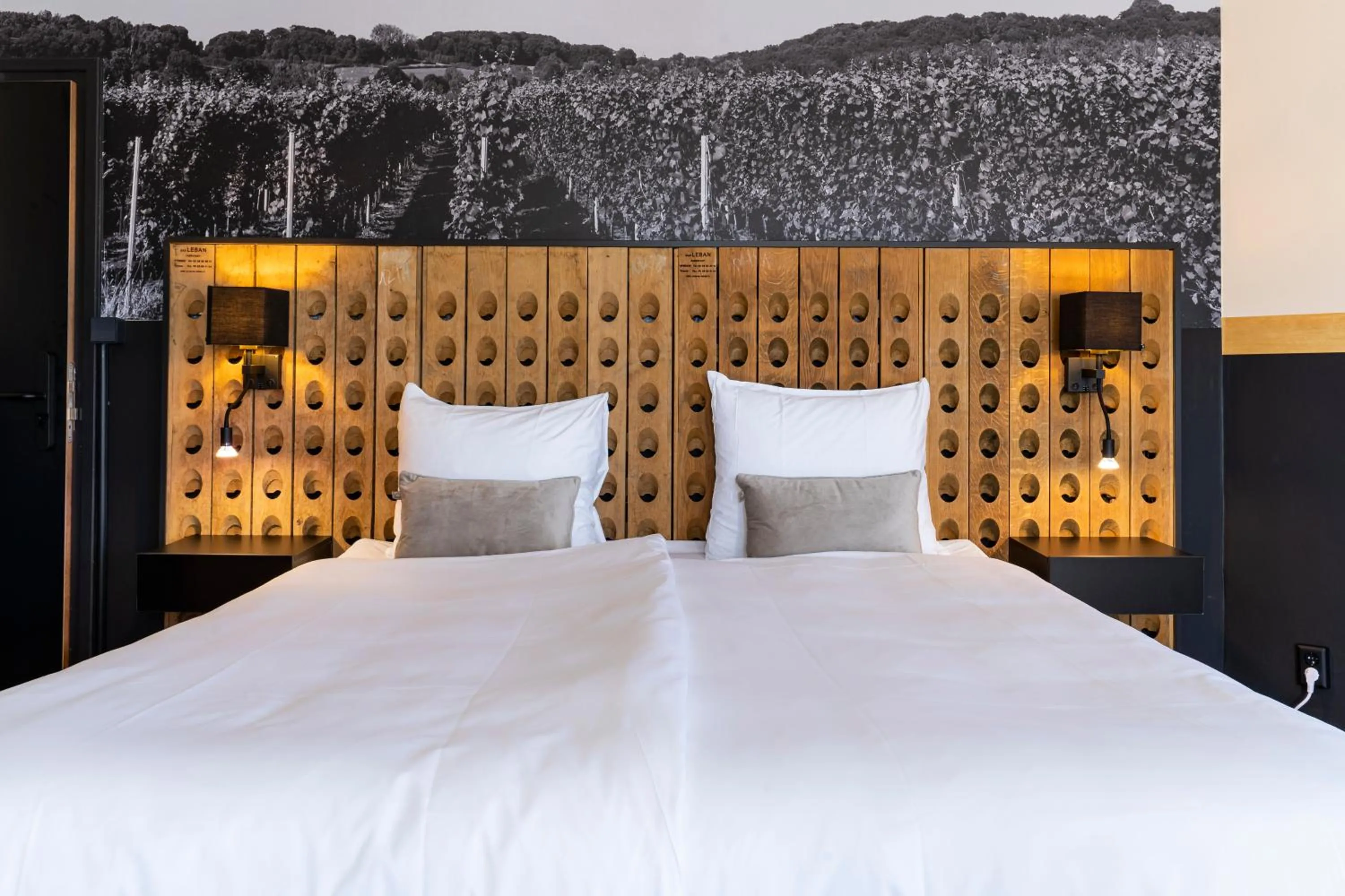 Bed in Dormio Wijnhotel Valkenburg