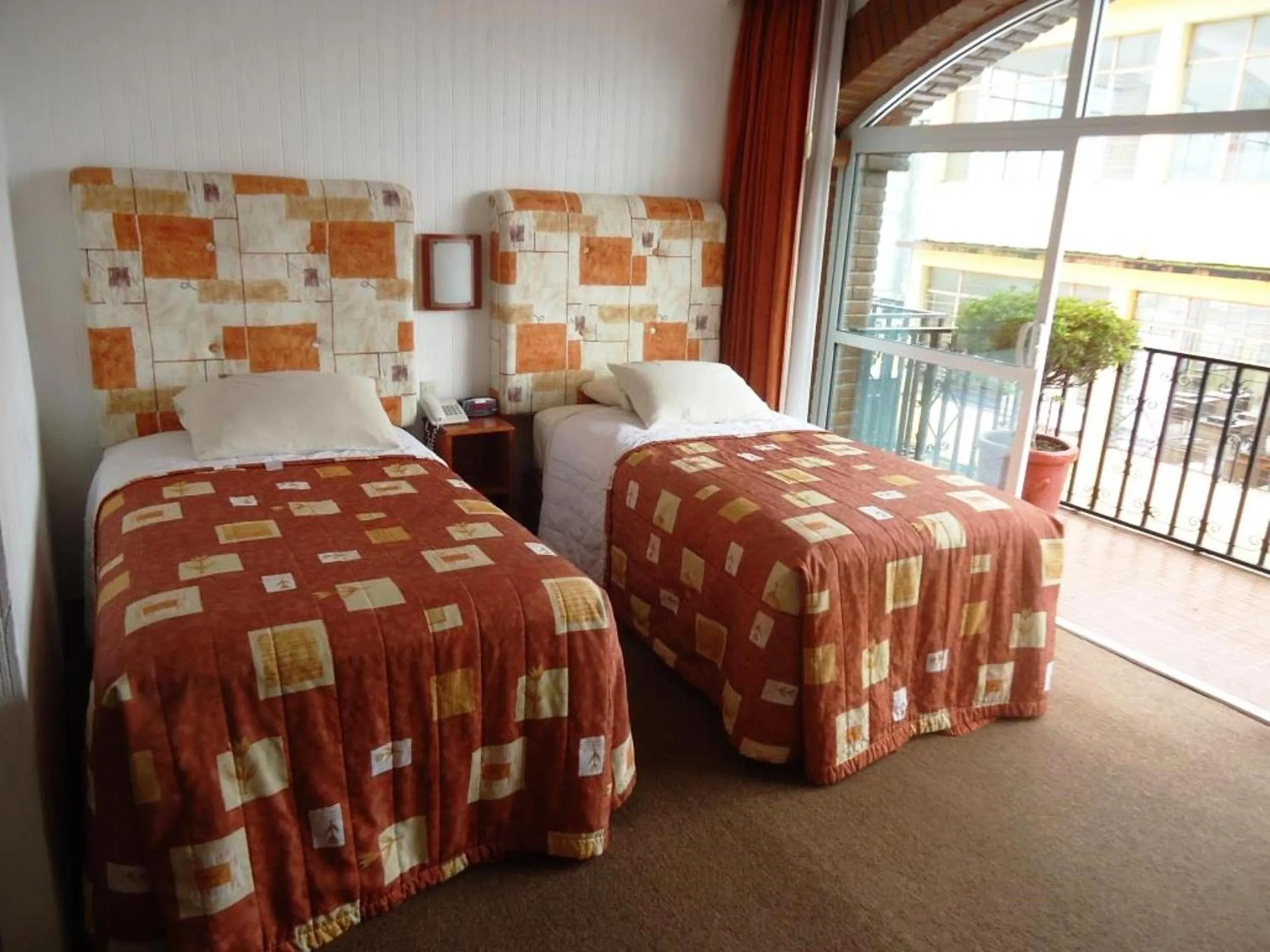 Bed in Hotel Villa de Cortez