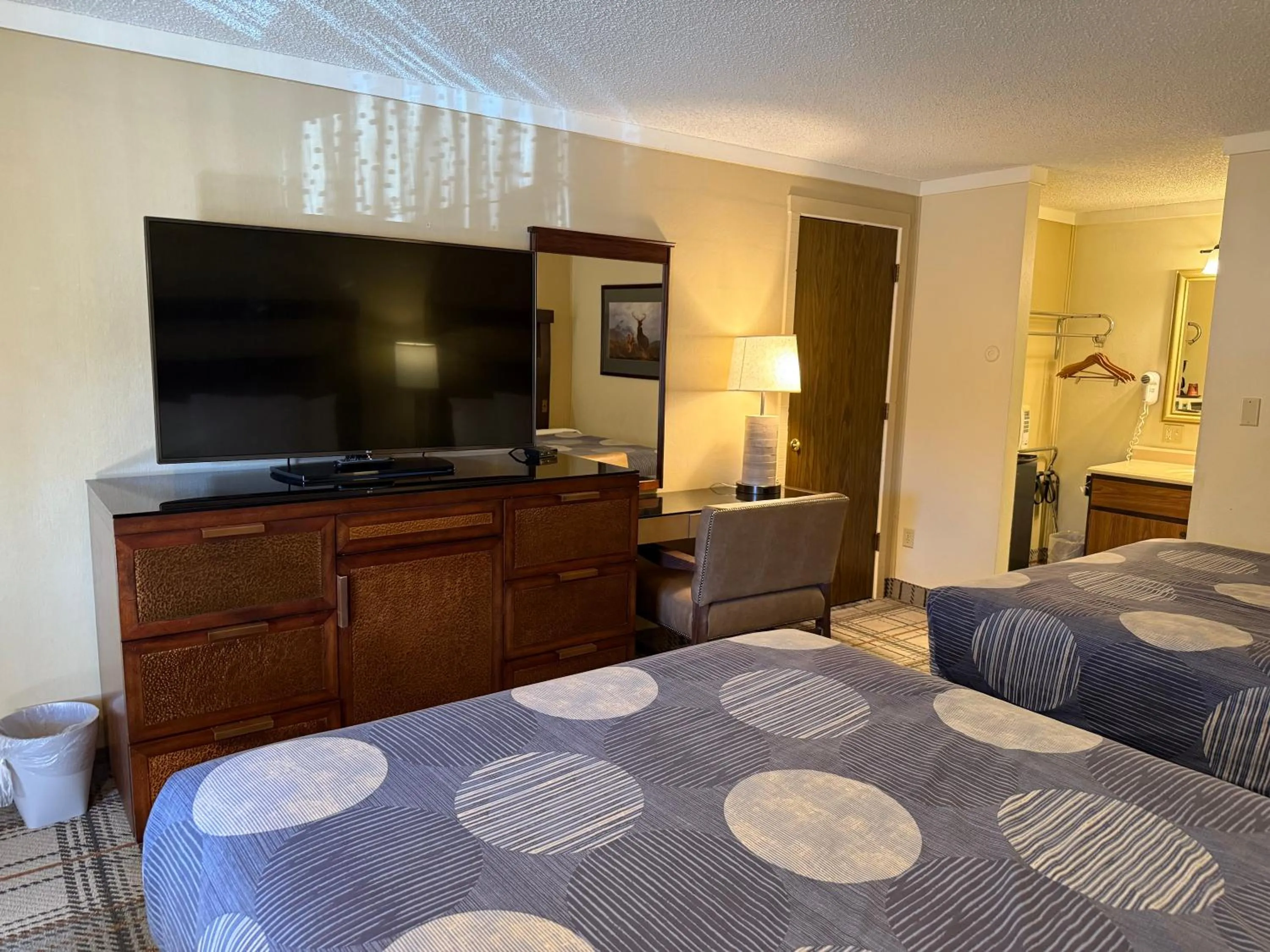 Bed in Snowshoe Motel