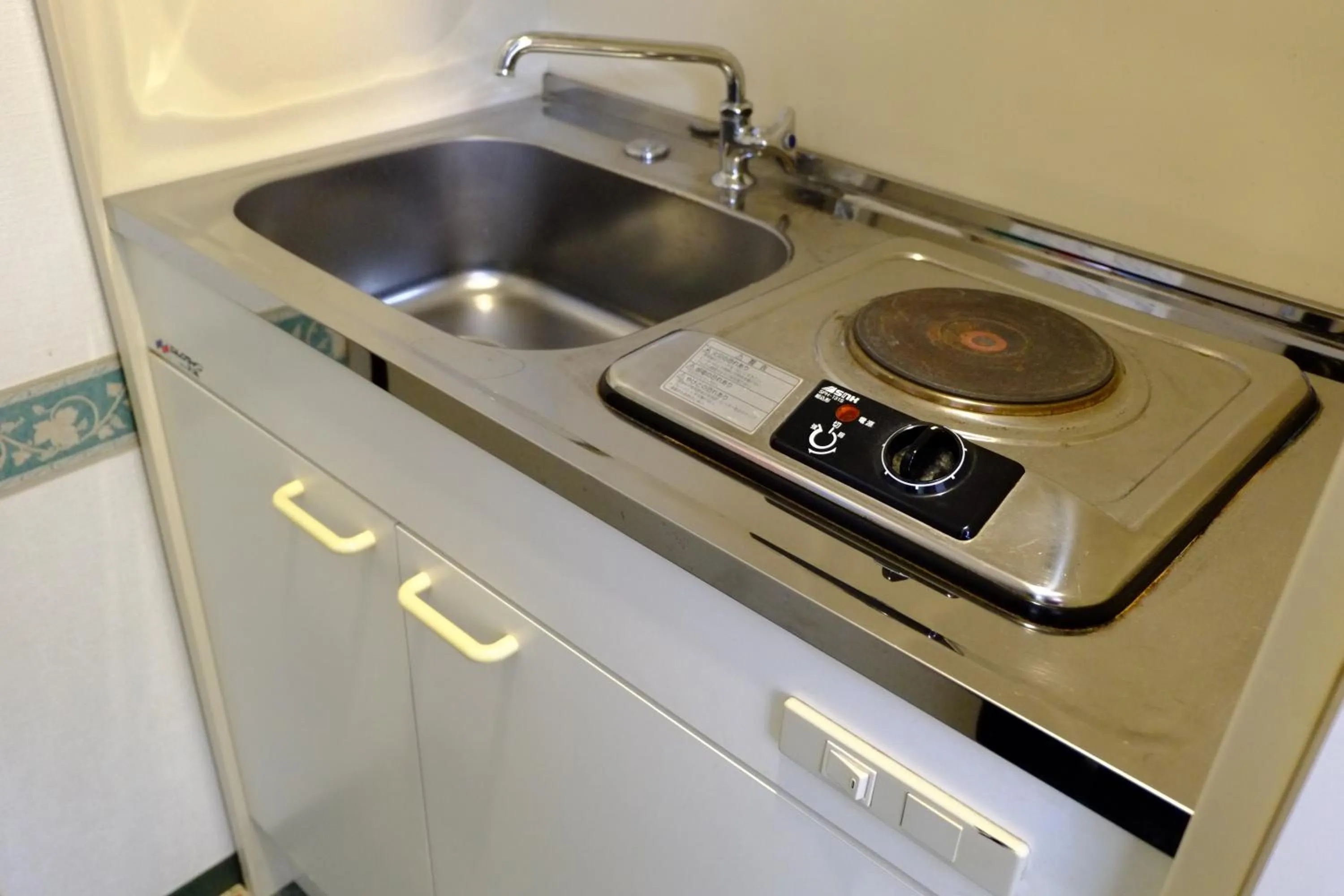 Kitchen or kitchenette in Hotel Check In Shimbashi