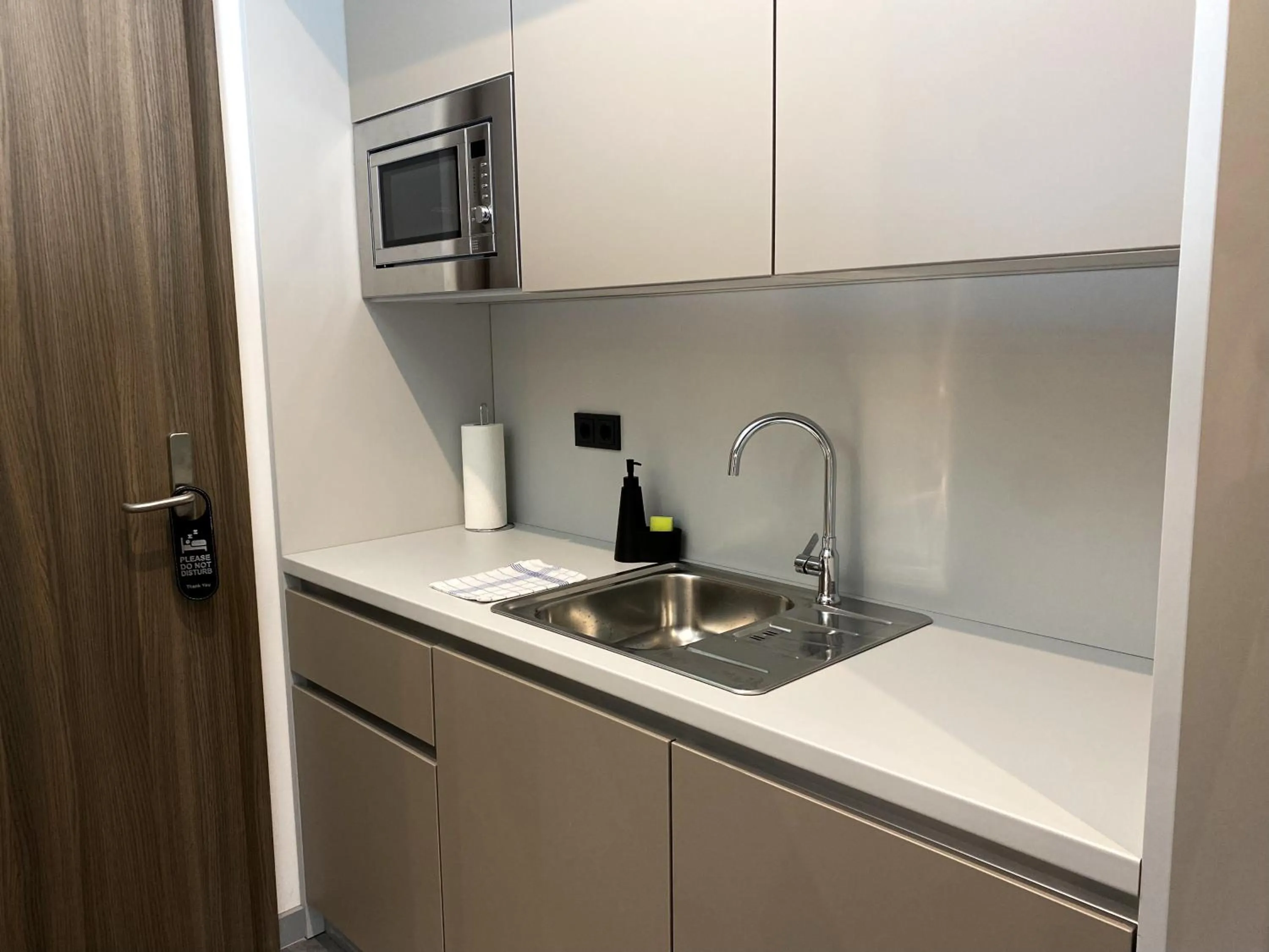 kitchen in NOVERA Aparthotel