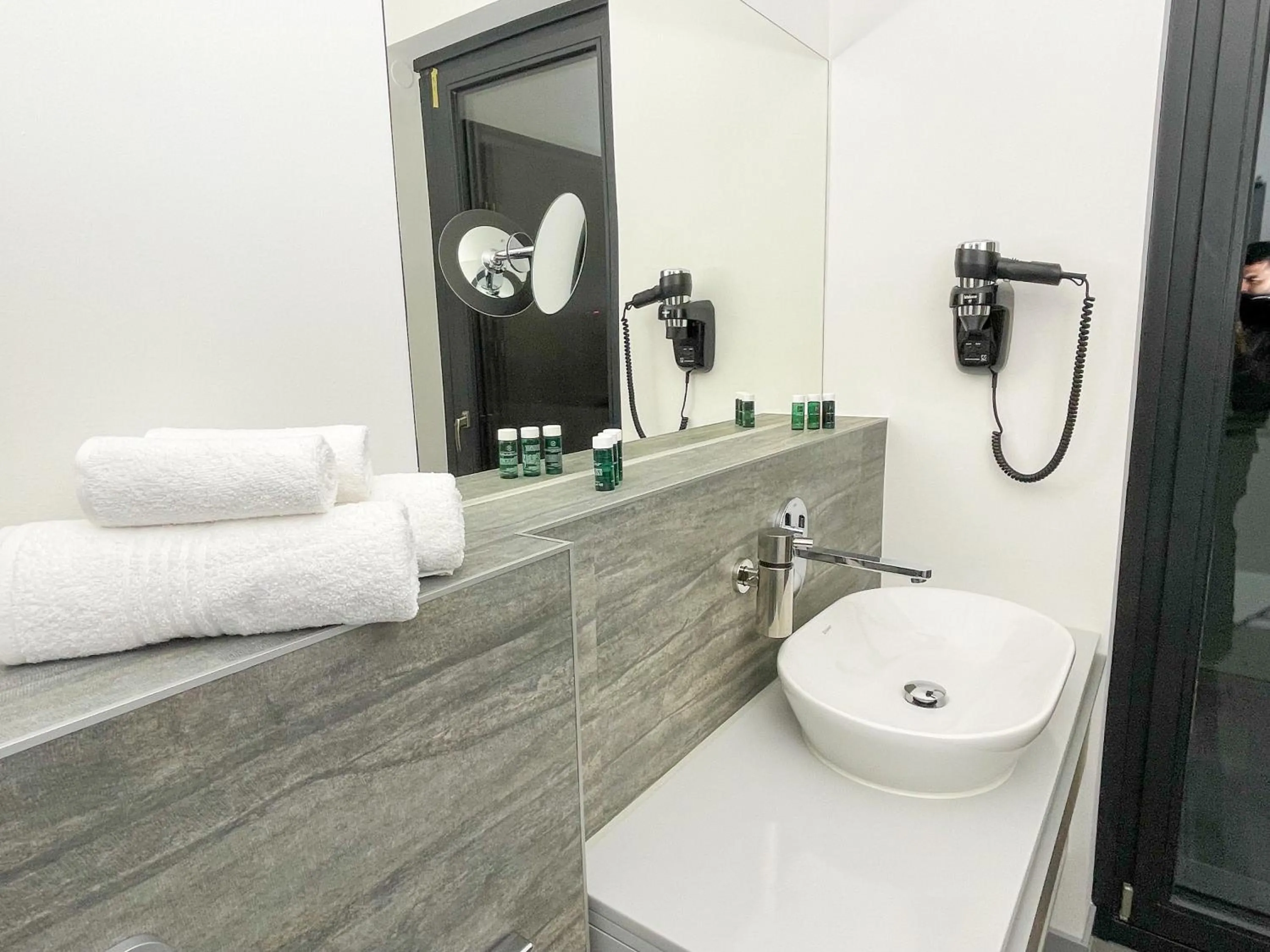 Bathroom in NOVERA Aparthotel