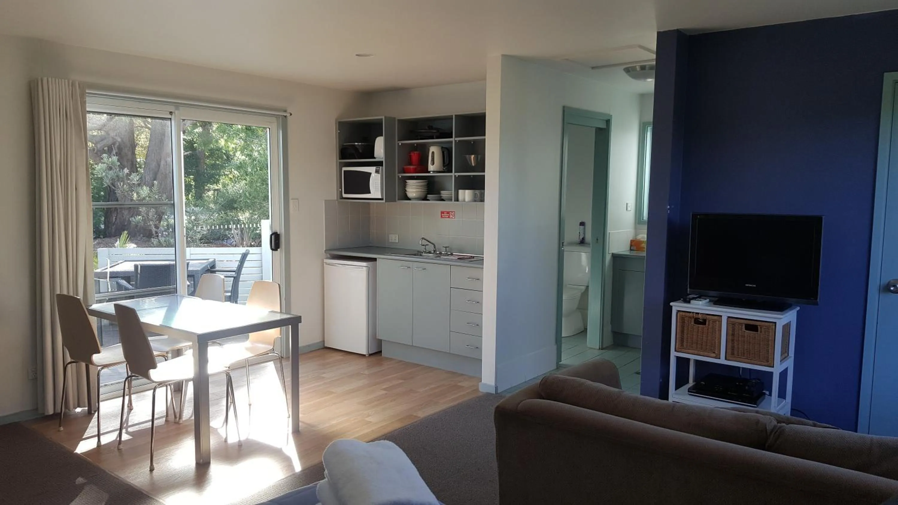 Living room in Huskisson Holiday Motel Cabins