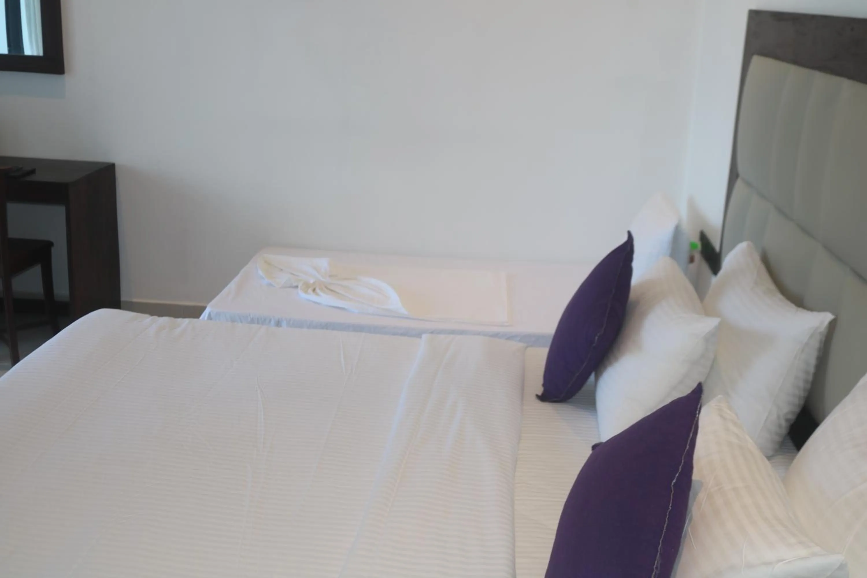 Bed in Mzion Hotel Weligama