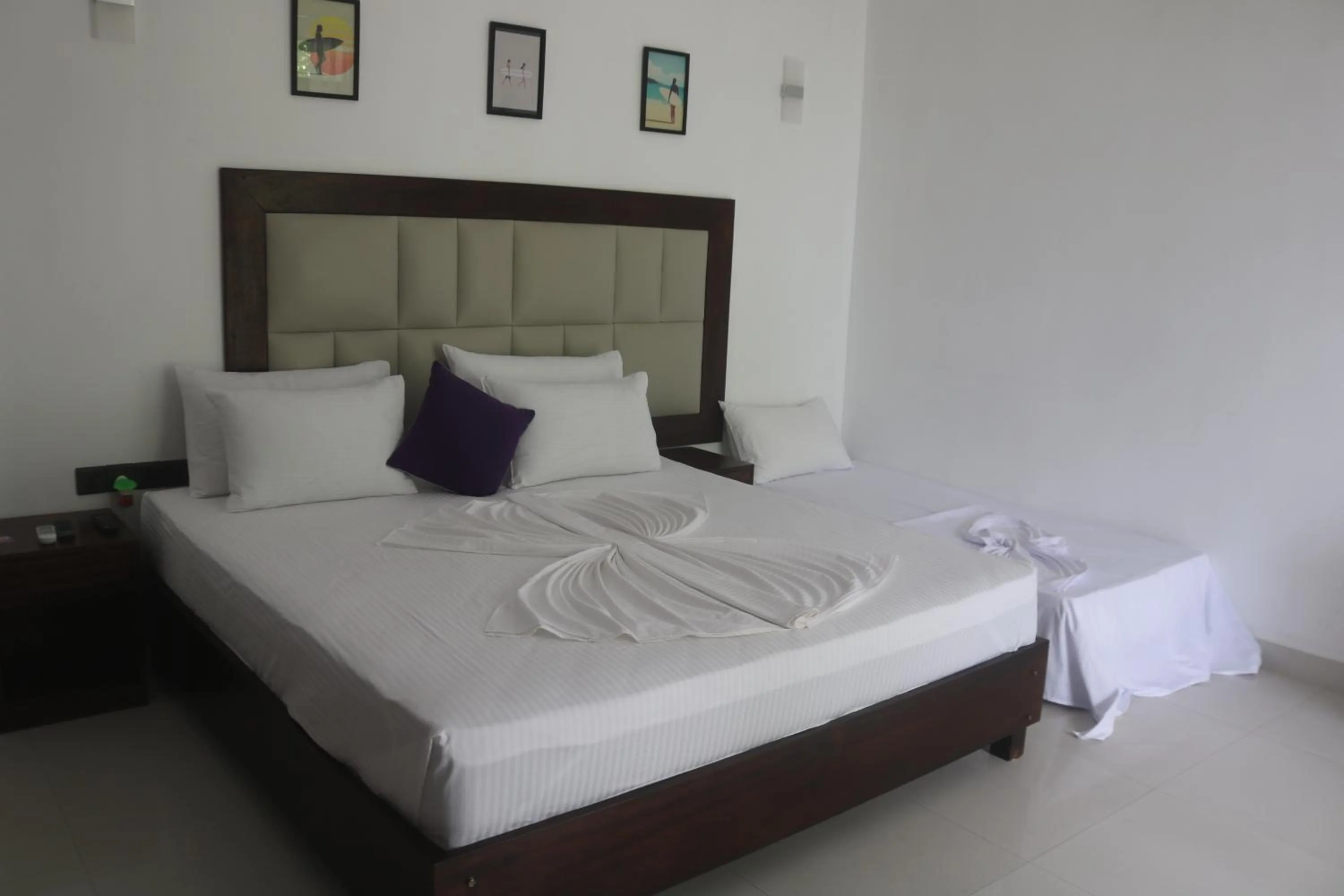 Bed in Mzion Hotel Weligama