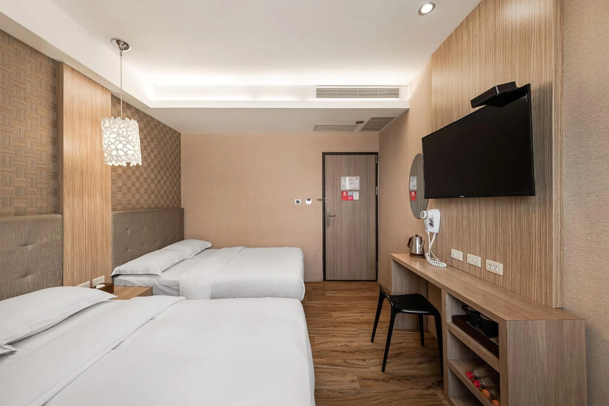 Bed in The Riverside Hotel Hengchun