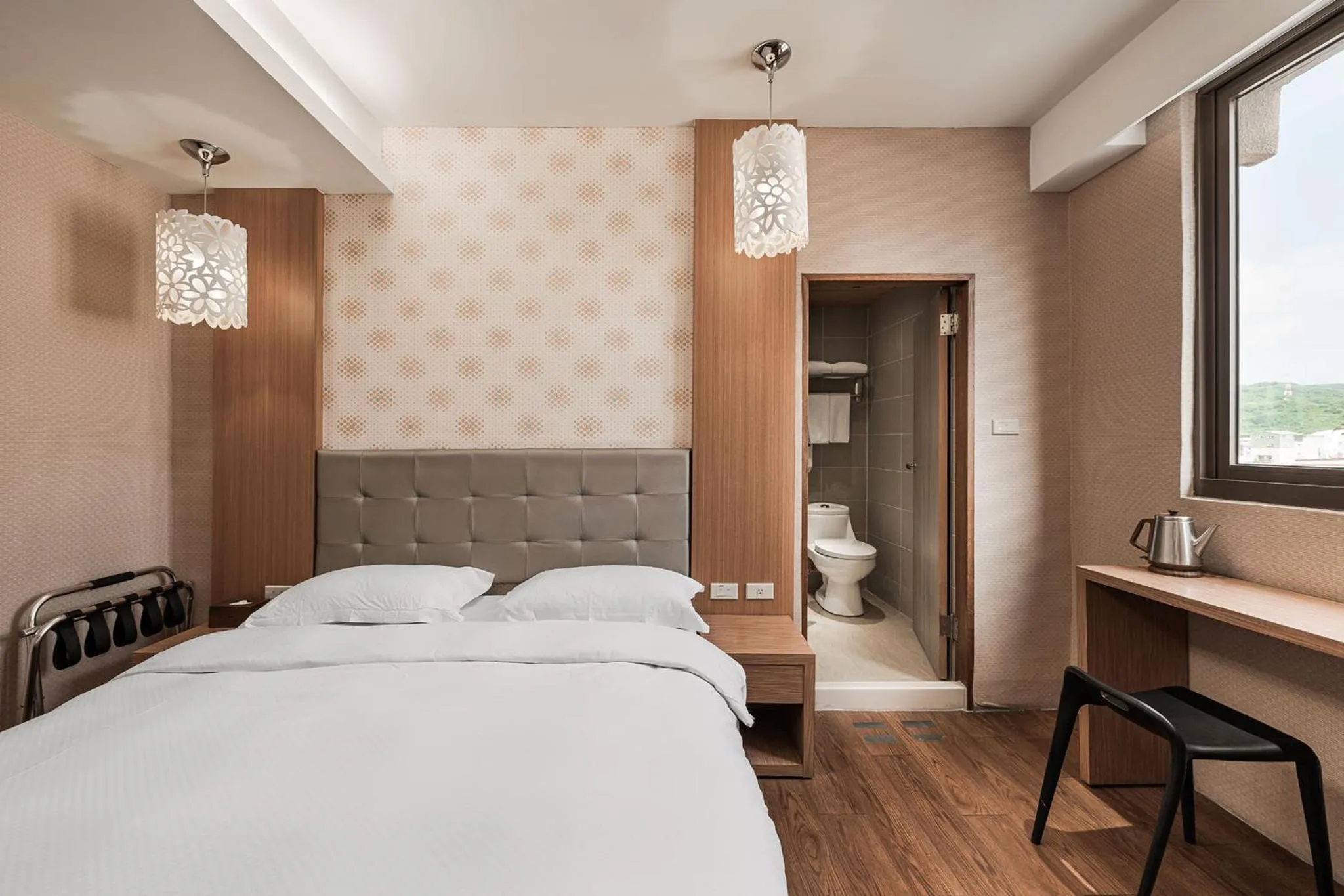 Bed in The Riverside Hotel Hengchun