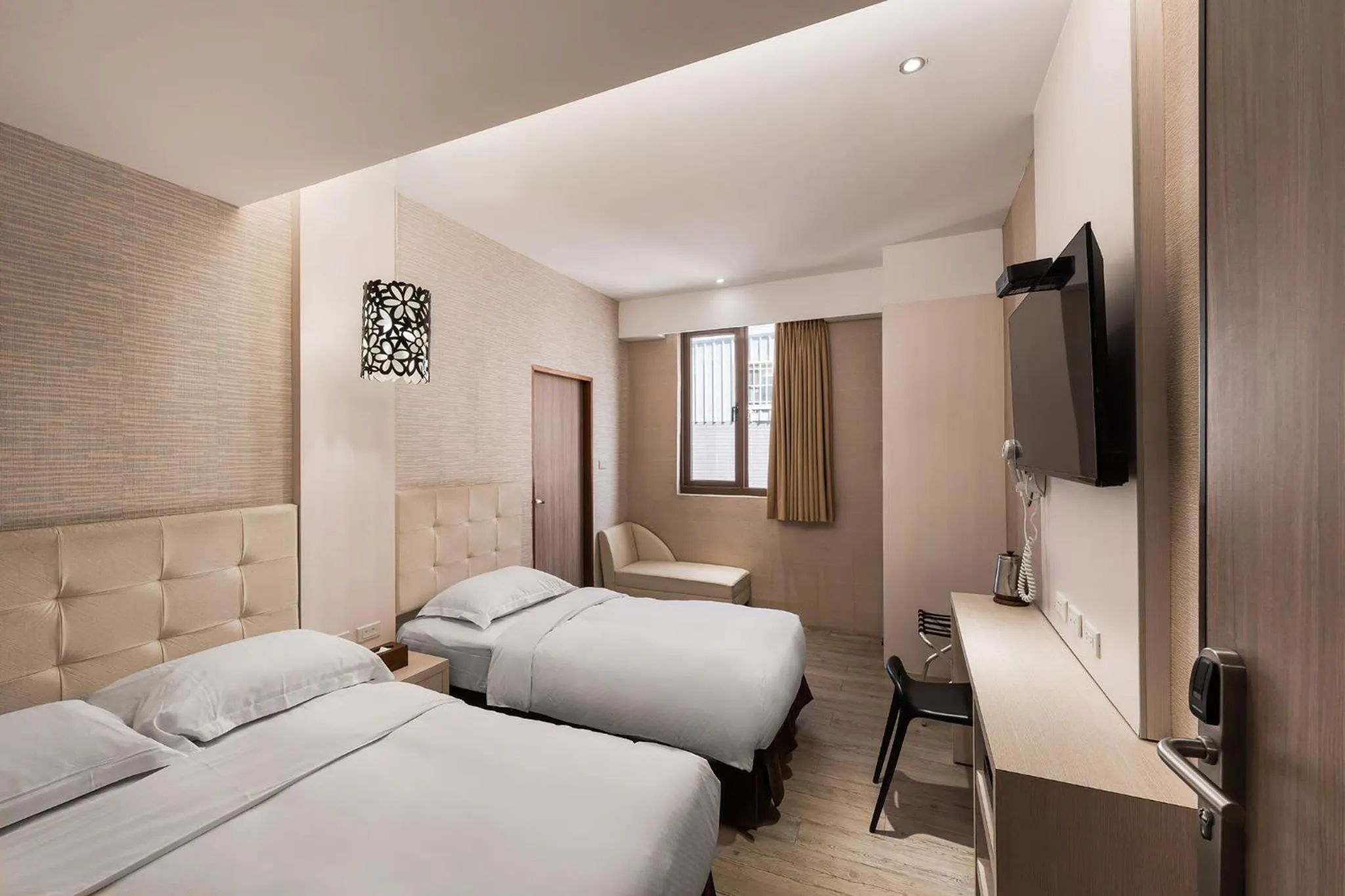 Bed in The Riverside Hotel Hengchun