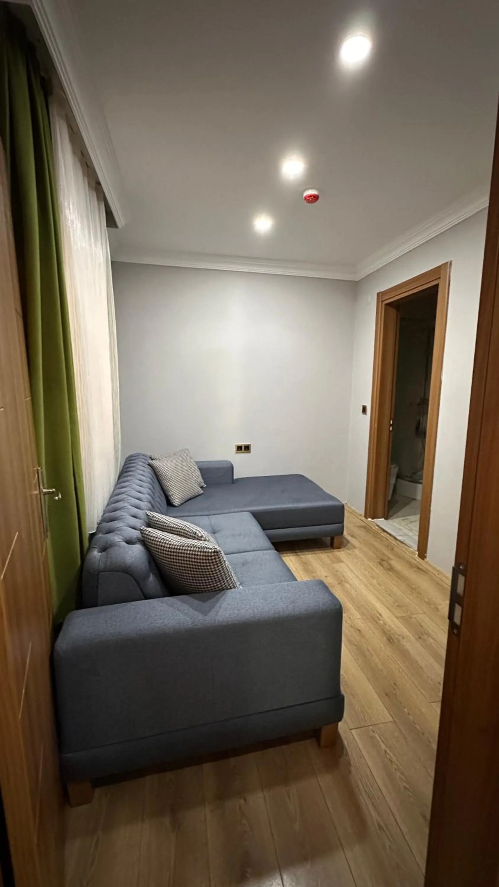 Living room, Bed in Dunya Residence