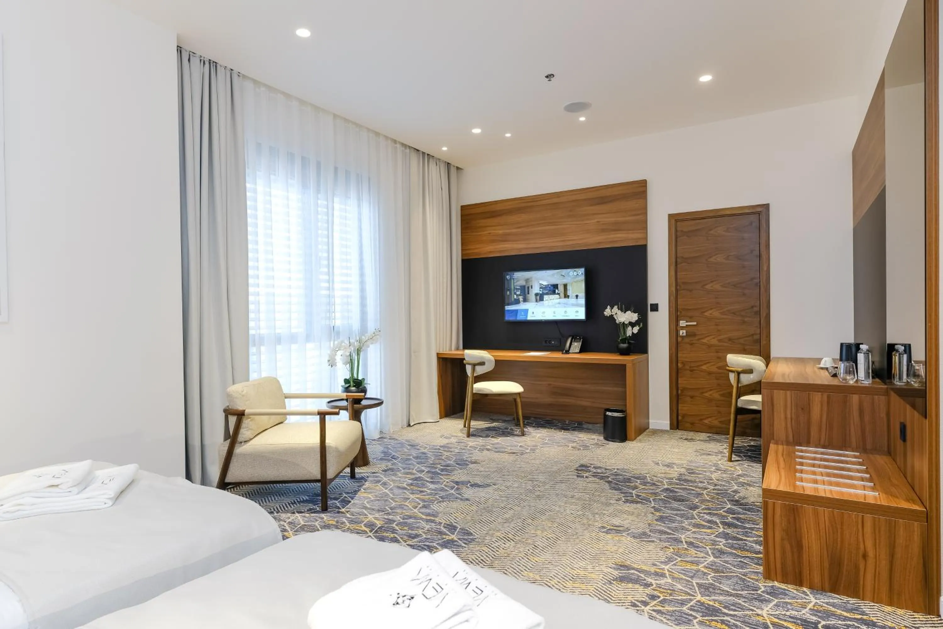 TV and multimedia, Bed in Hotel Vema