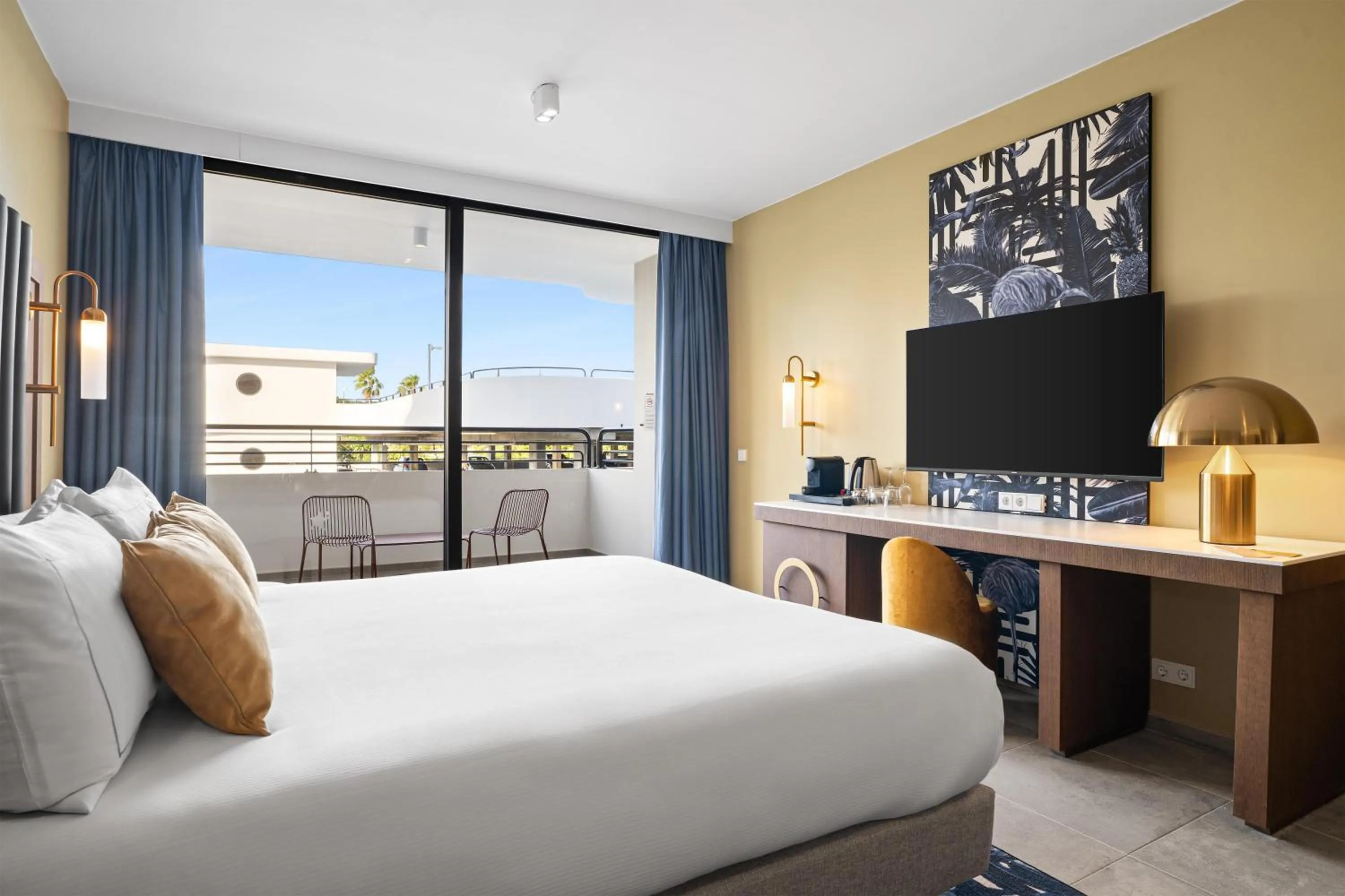 Bed in The Rif At Mangrove Beach Corendon Curacao All-Inclusive, Curio by Hilton