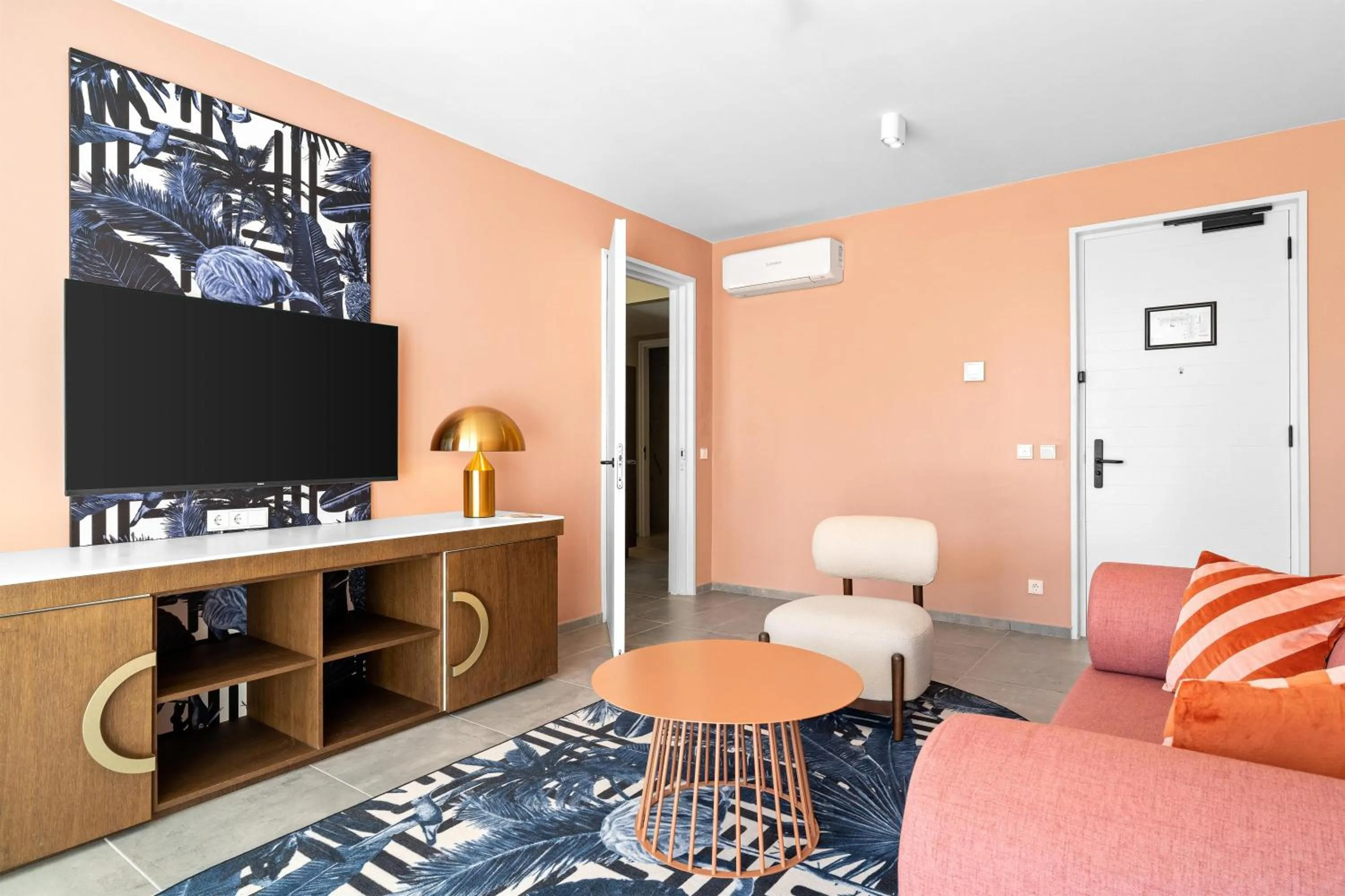 Living room in The Rif At Mangrove Beach Corendon Curacao All-Inclusive, Curio by Hilton