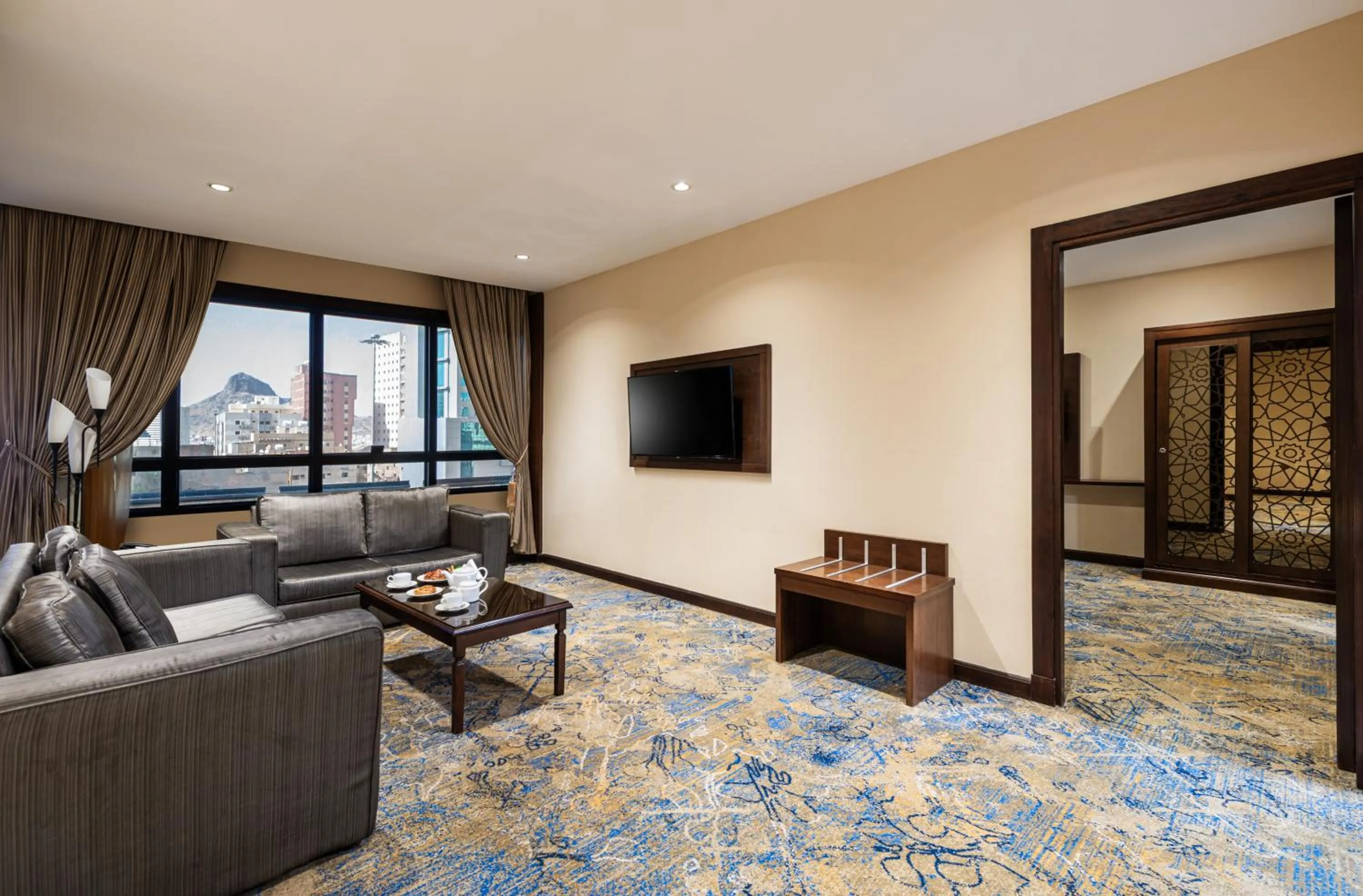 Living room in Razana Al Rawdha Hotel