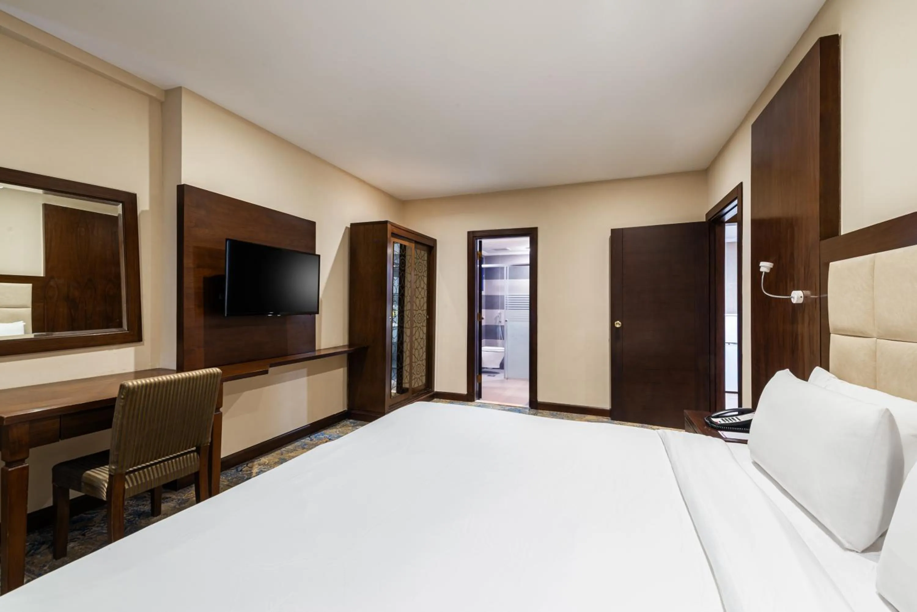 Bed in Razana Al Rawdha Hotel