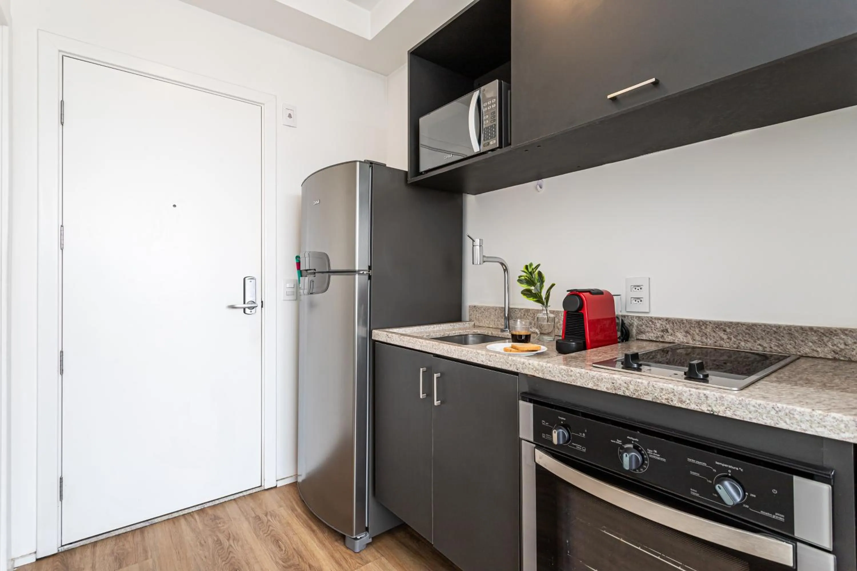 Kitchen or kitchenette in Setin Downtown Praca da Sé by Viva - Prédio completo com piscina perto de estação de metrô no Centro de São Paulo