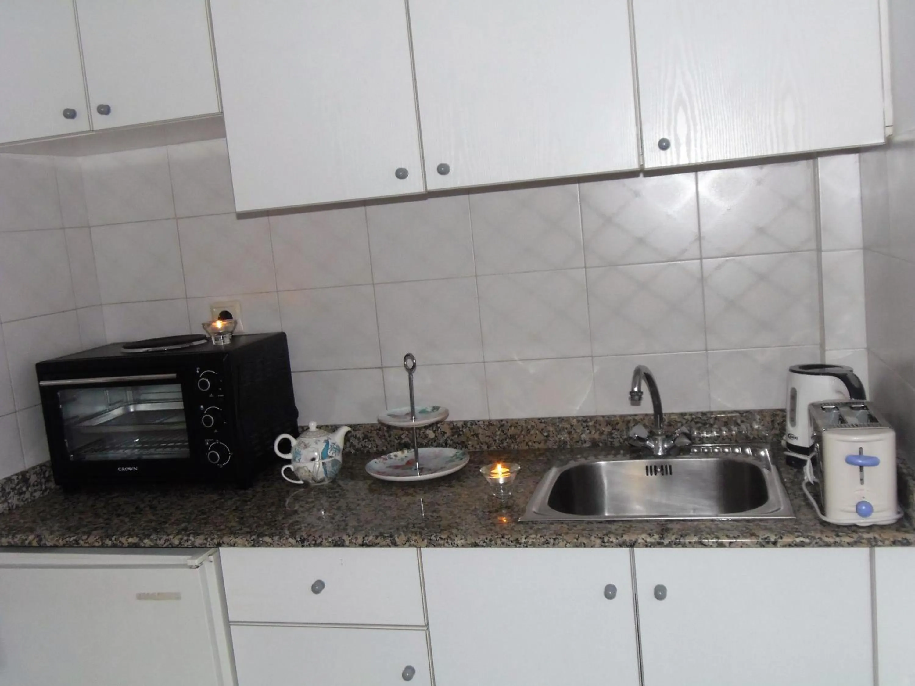 Kitchen or kitchenette in Emerald Hotel