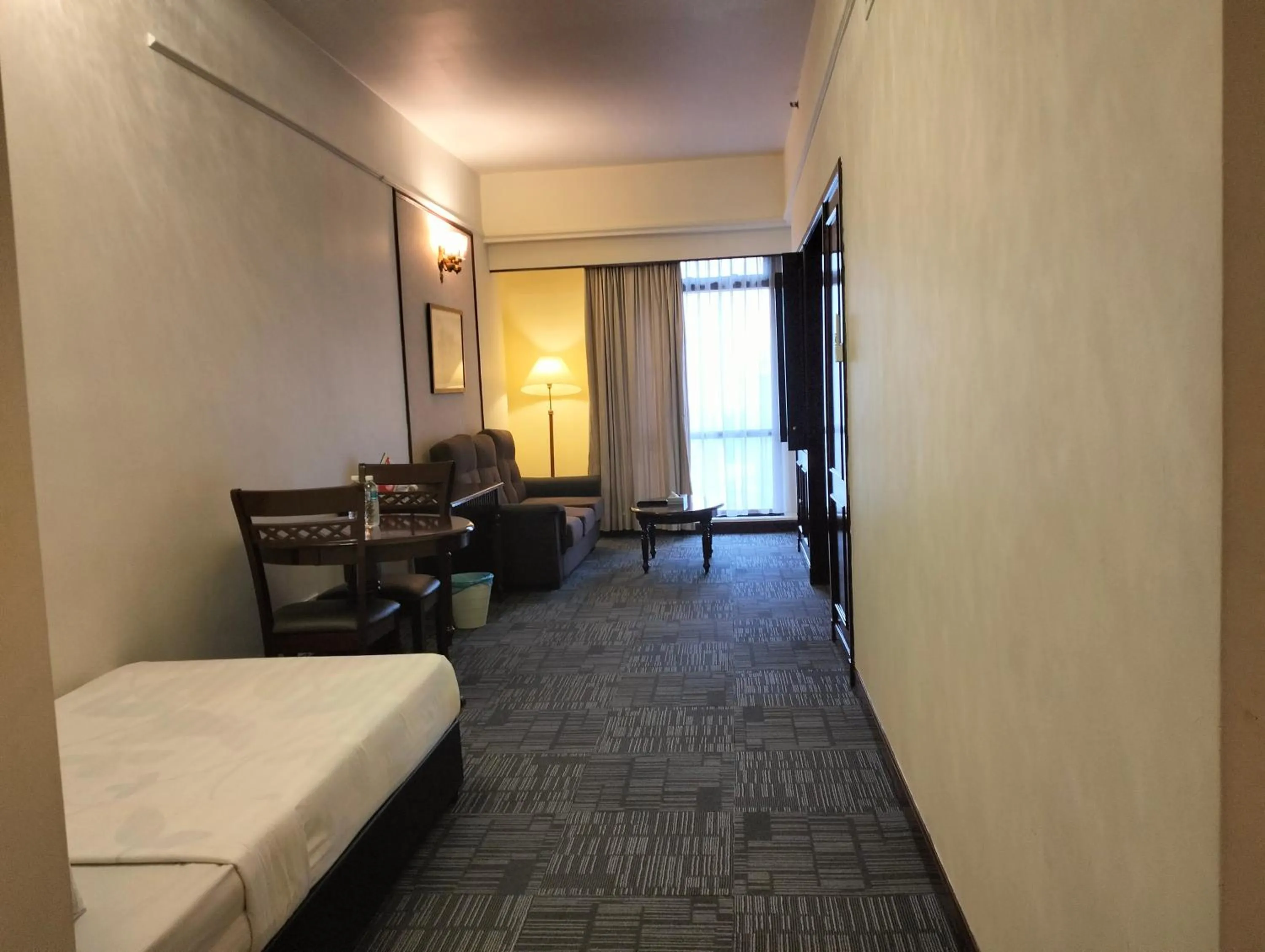 Living room, Bed in Times Square Kuala Lumpur By Service Suite