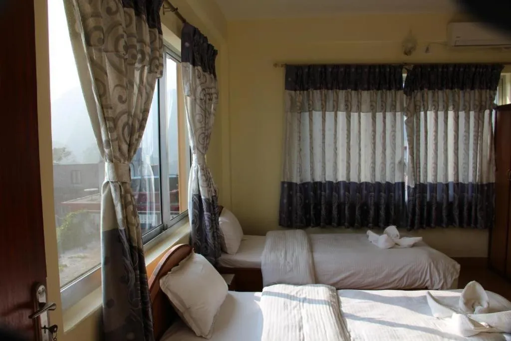 Bed in Hotel Milarepa Pvt Ltd