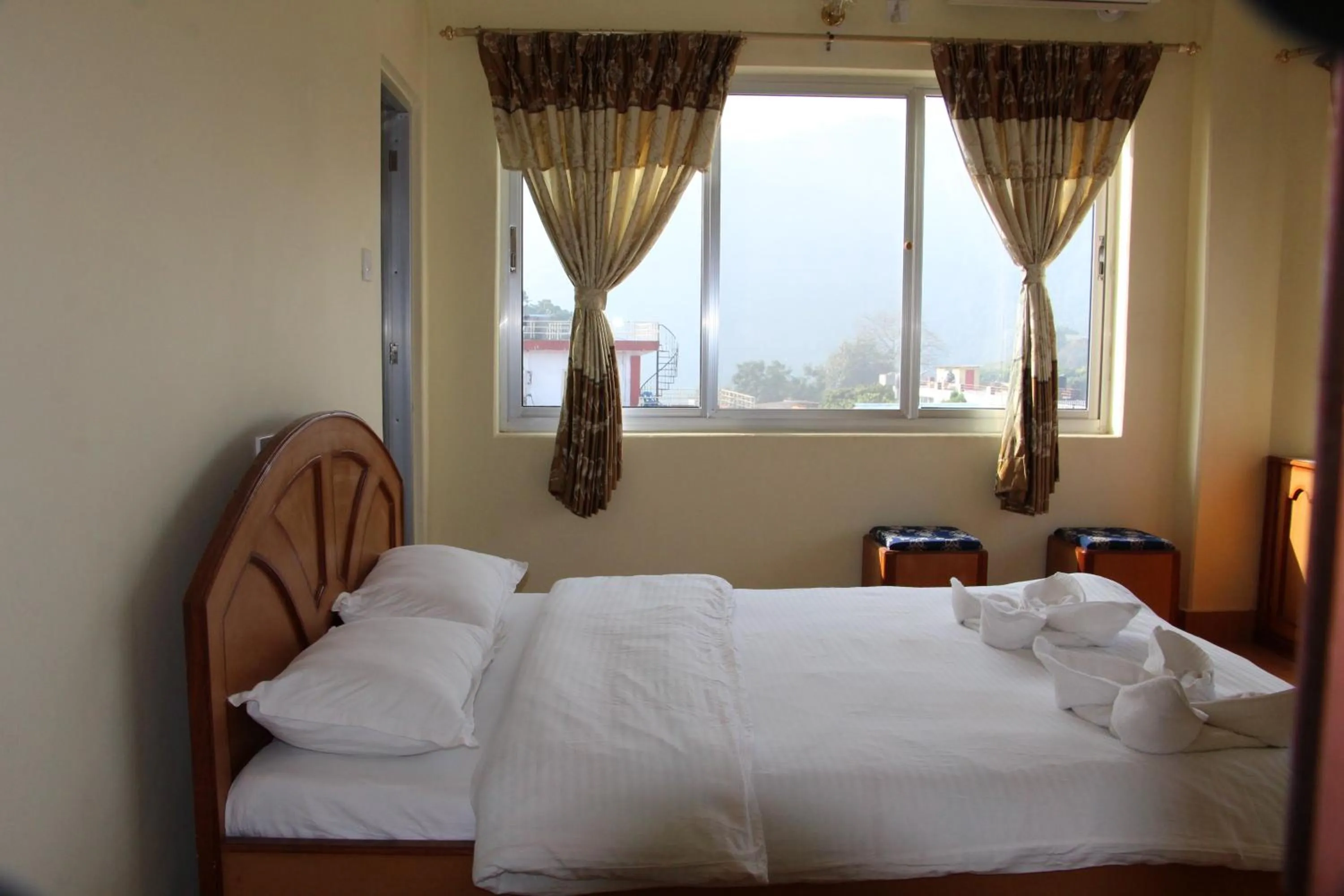 Bed in Hotel Milarepa Pvt Ltd