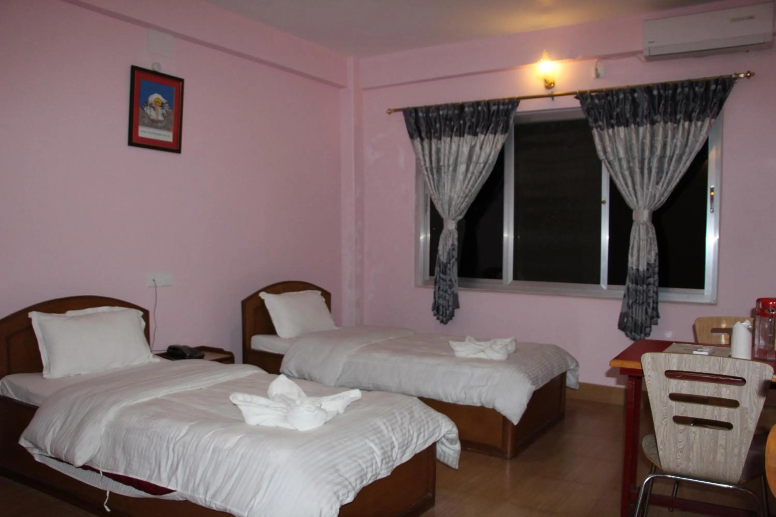 Bed in Hotel Milarepa Pvt Ltd