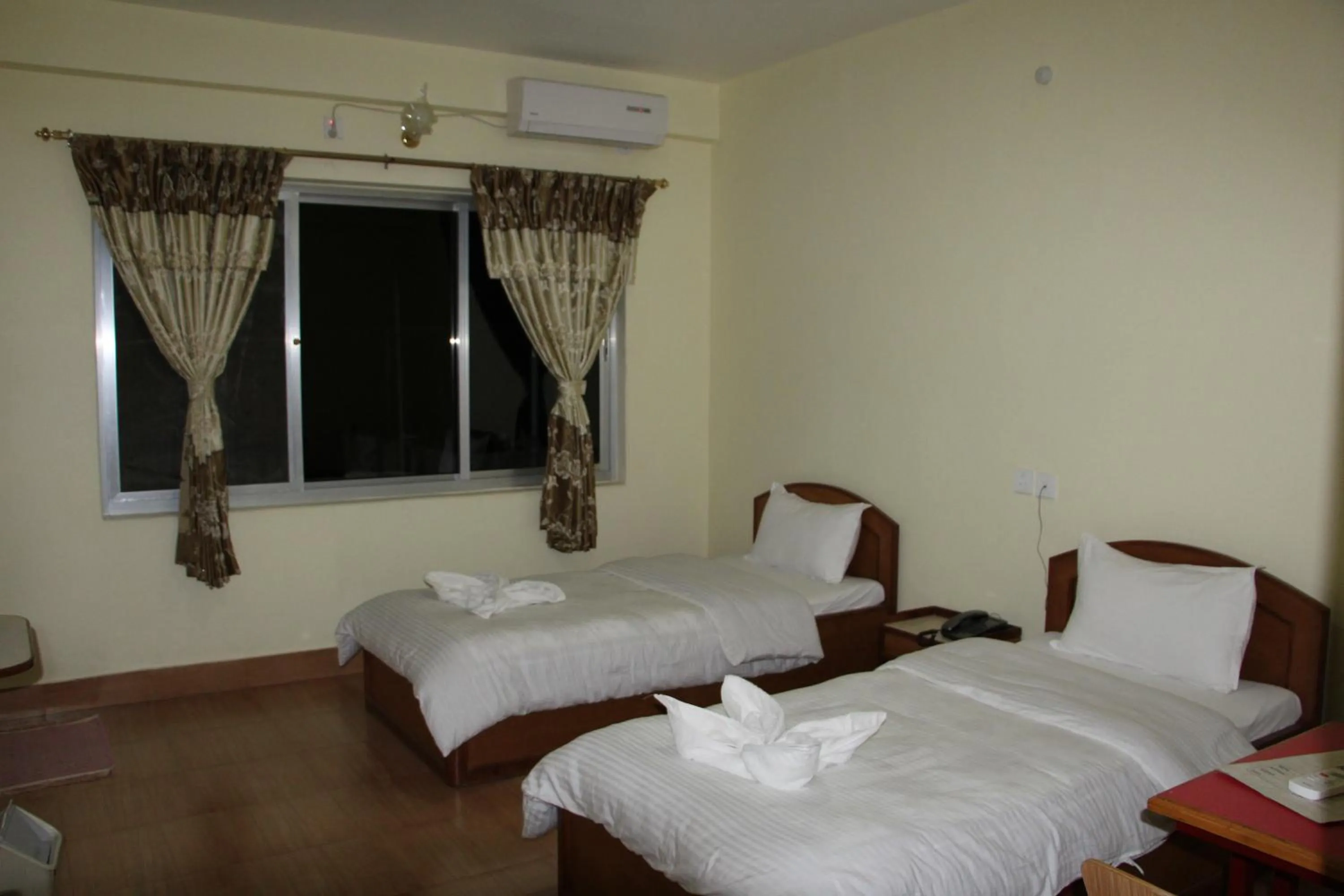 Bedroom in Hotel Milarepa Pvt Ltd