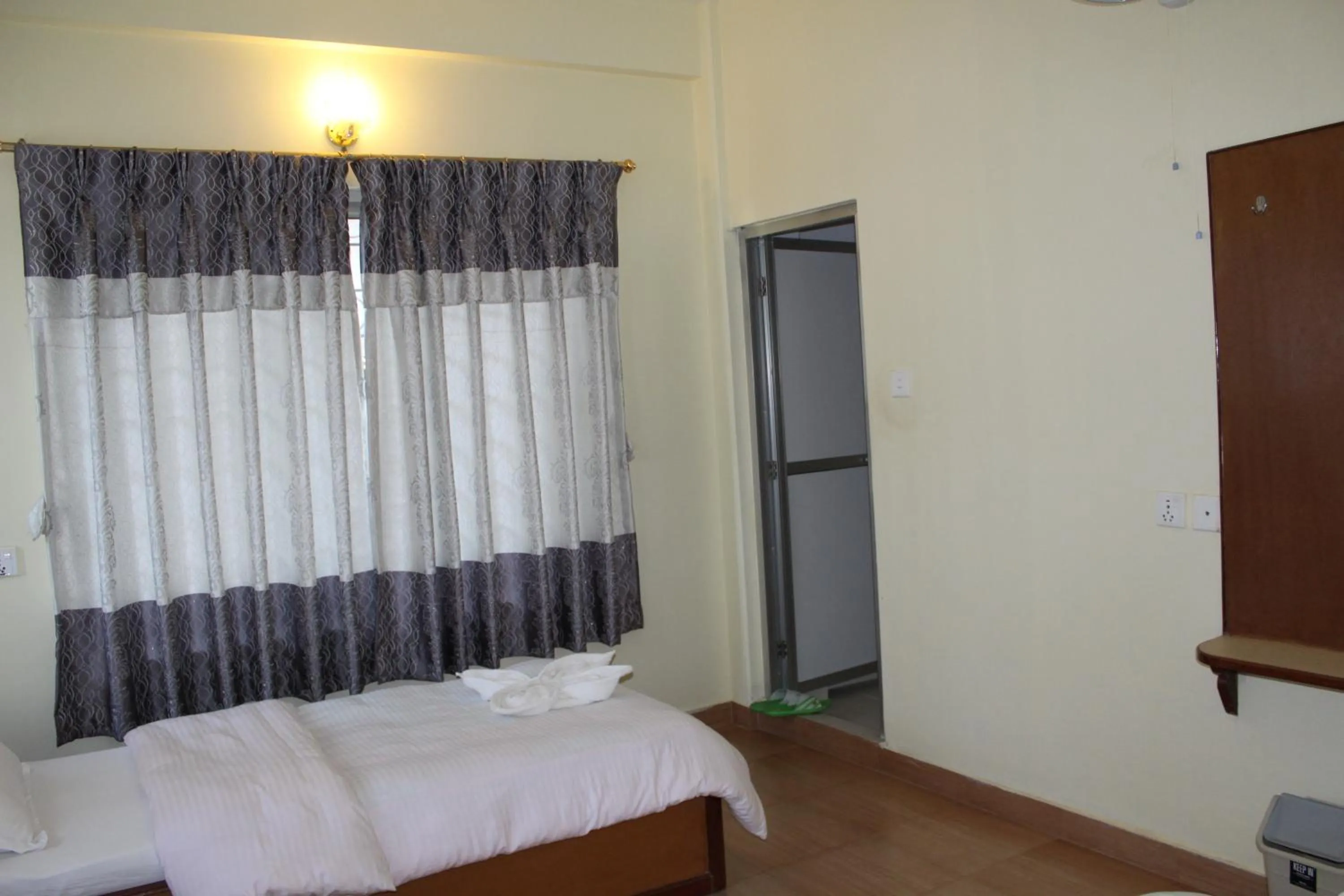 Bedroom in Hotel Milarepa Pvt Ltd