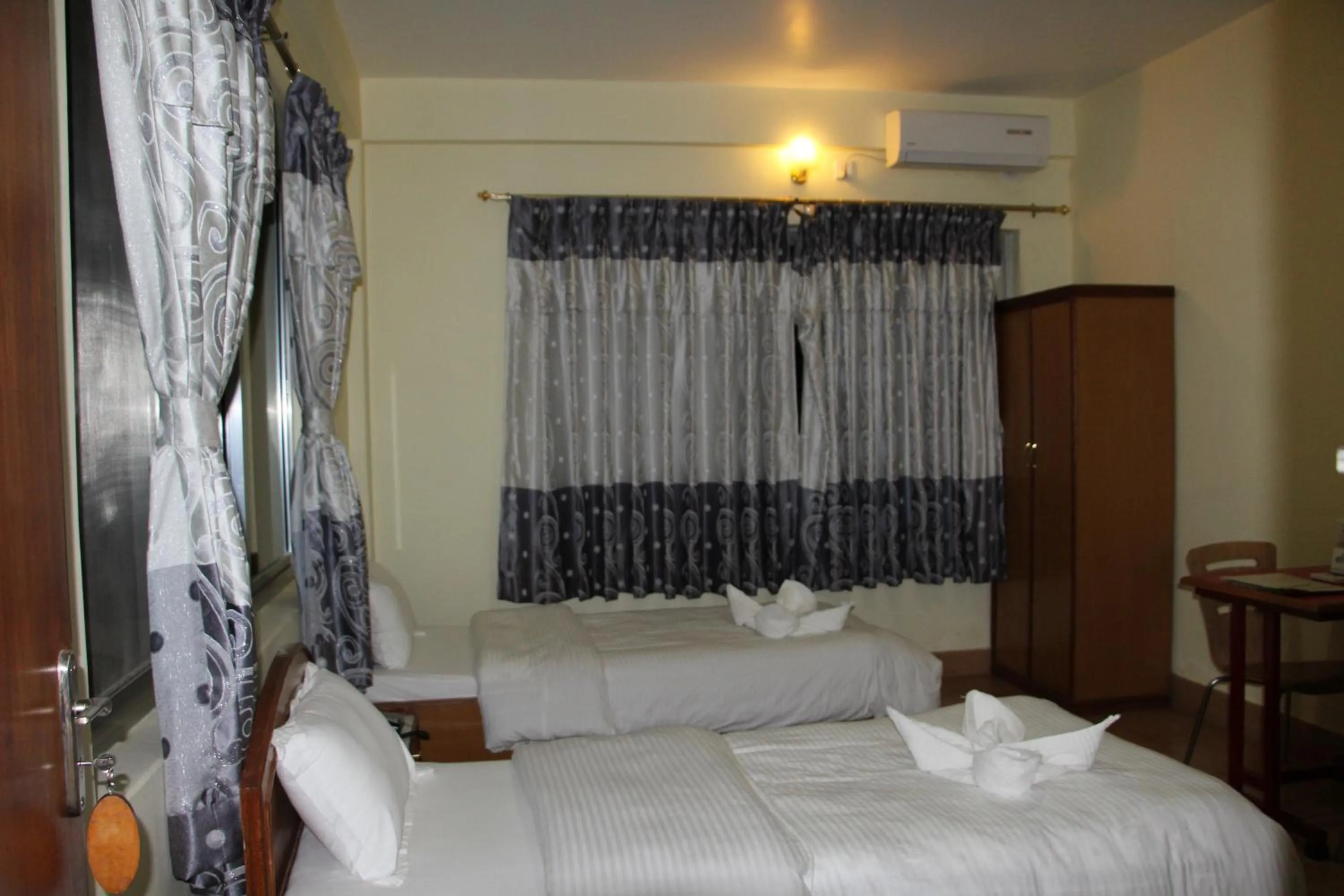 Bed in Hotel Milarepa Pvt Ltd