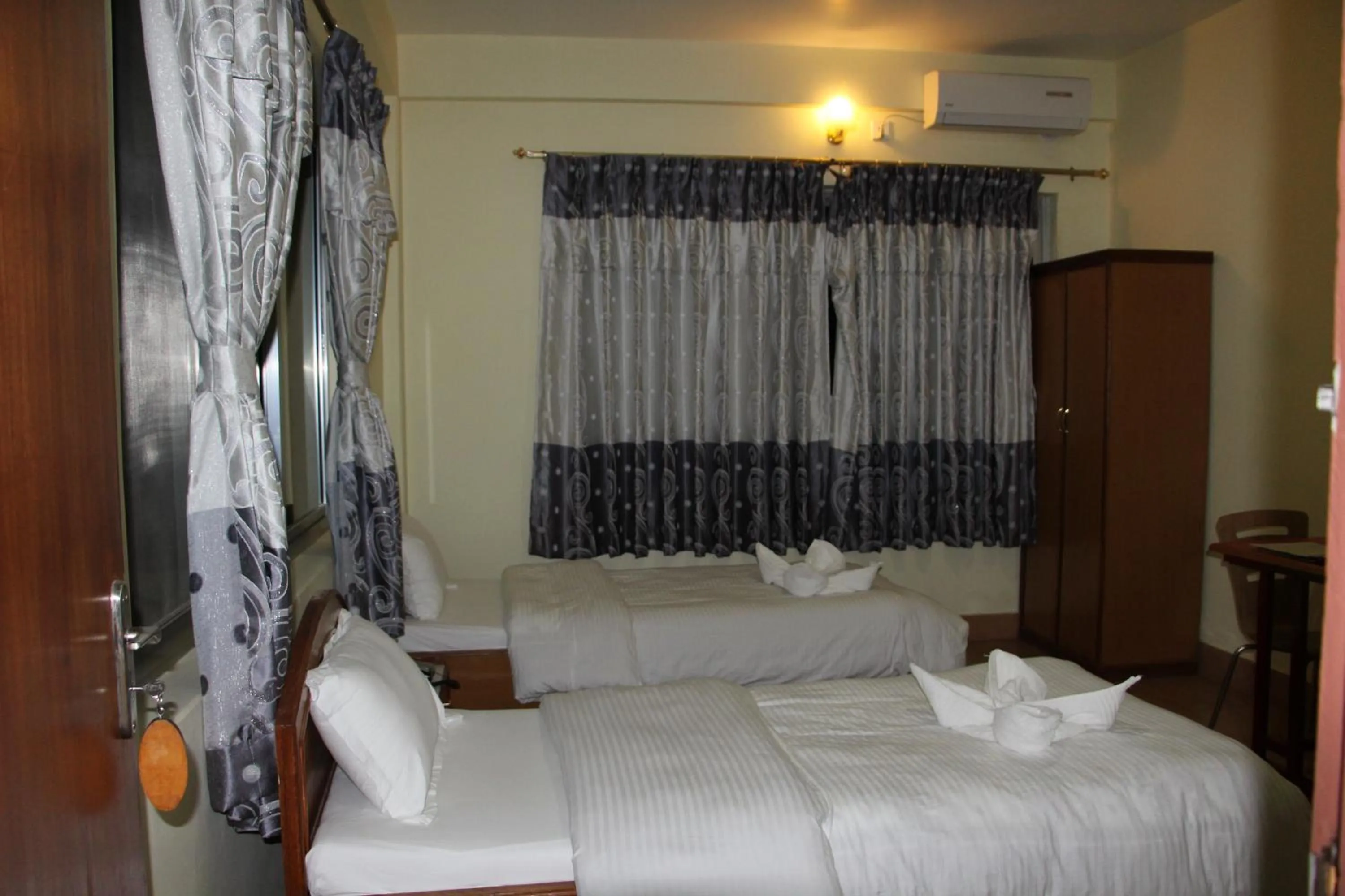 Bedroom in Hotel Milarepa Pvt Ltd