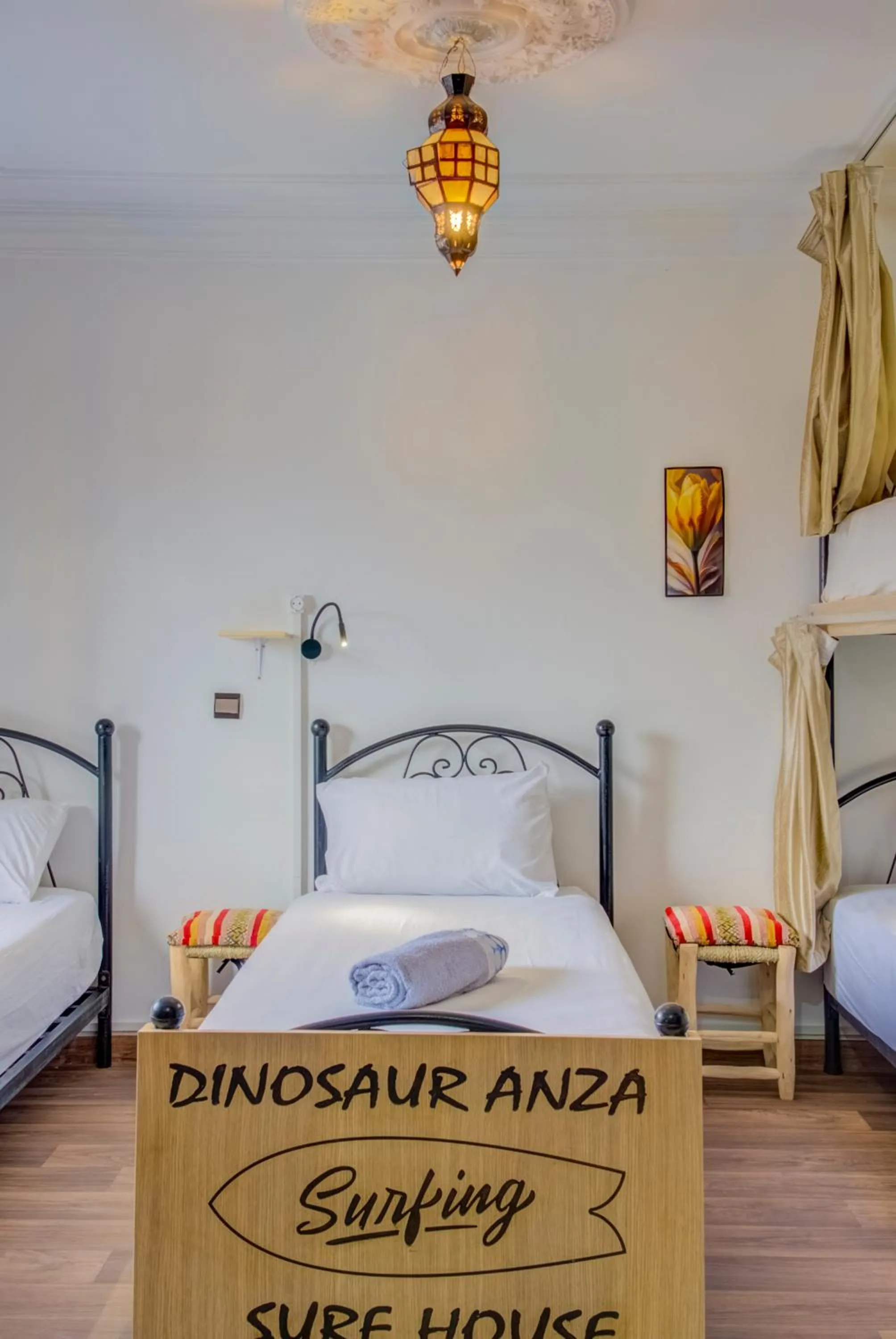 Bed in Dinosaur Anza Surf House